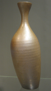 Photograph: Lustre leaning vase with high neck, c1980, Joanna Constantinidis (1927-2000). Height: 42.5cm