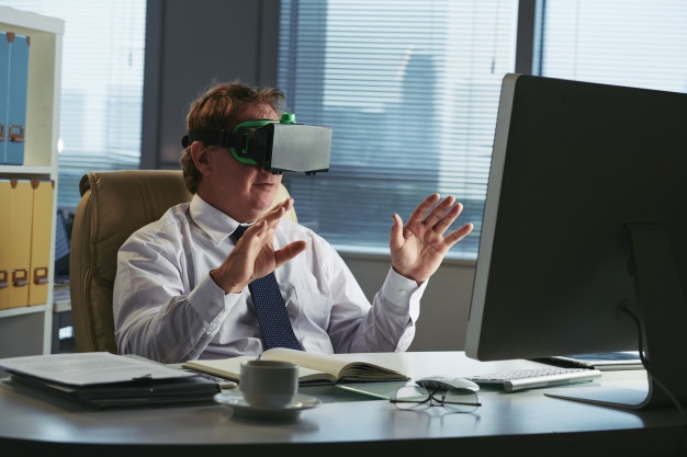 business-executive-vr-headset-his-office_1098-19029