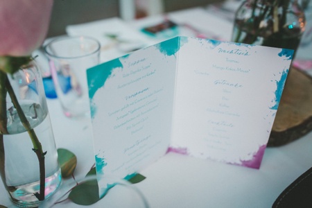 An eco-friendly wedding menu listing numerous vegan starters, main courses, and desserts