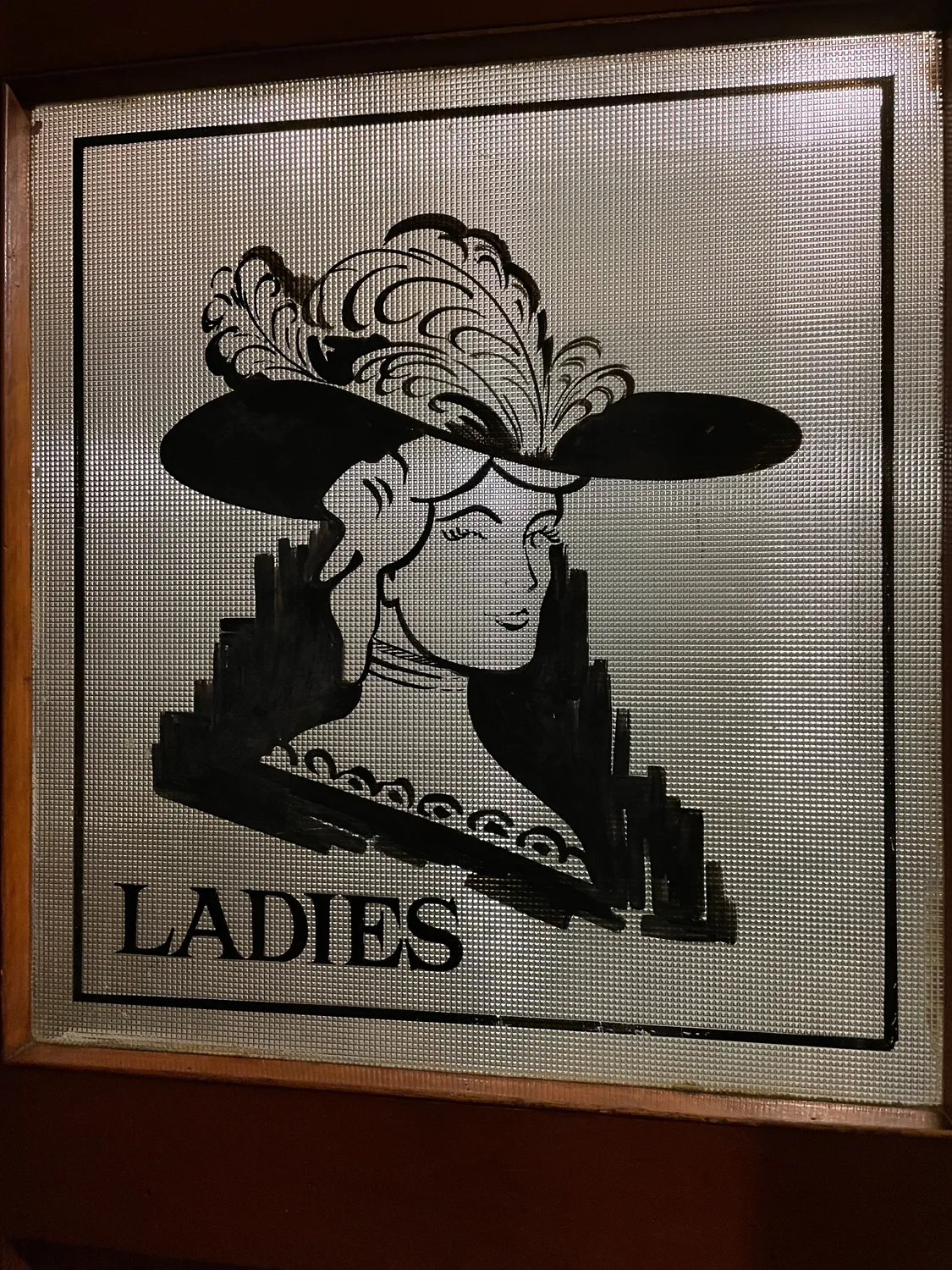 Ladies' restroom door