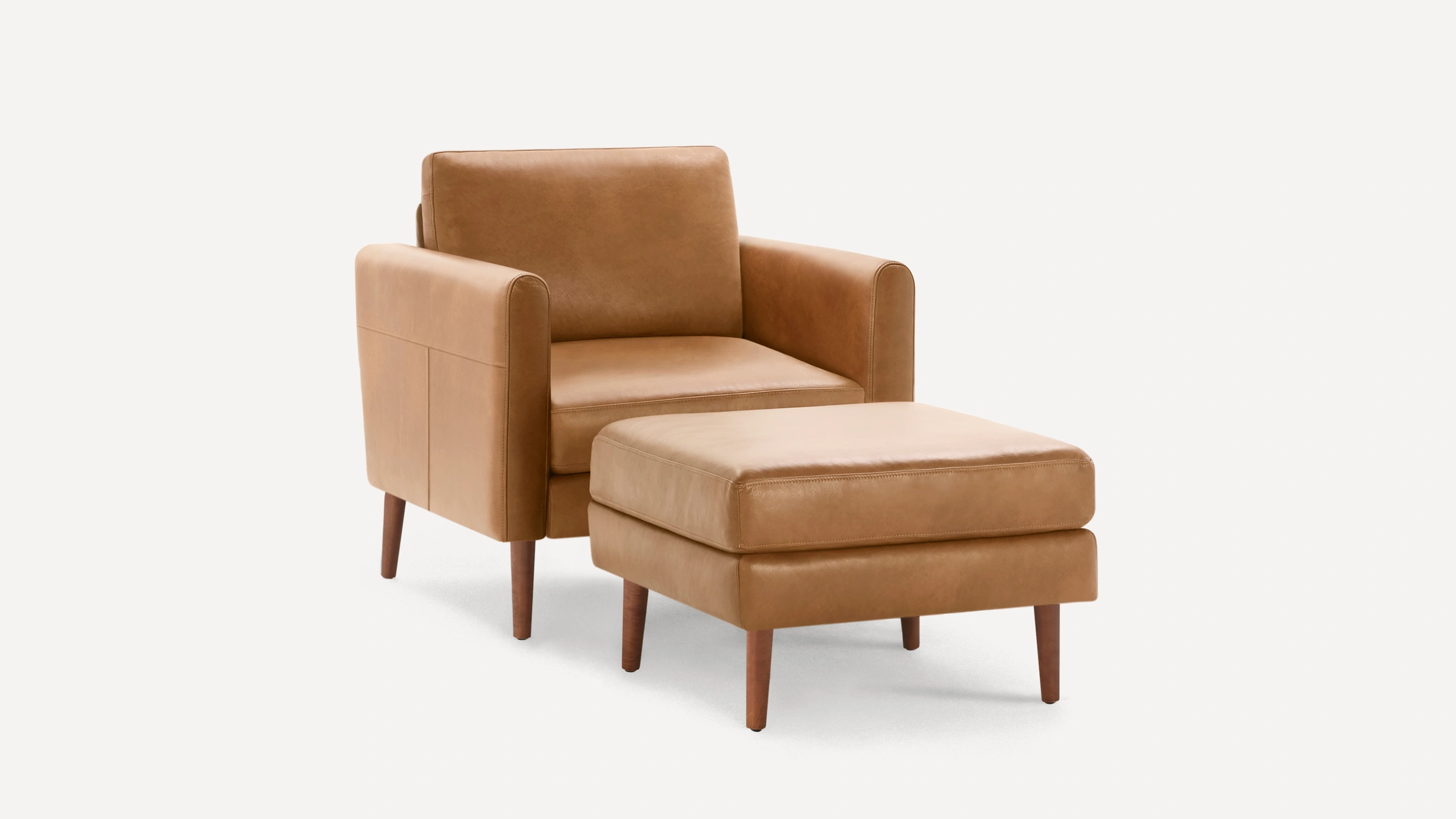 The Nomad Leather Club Chair with Ottoman Burrow