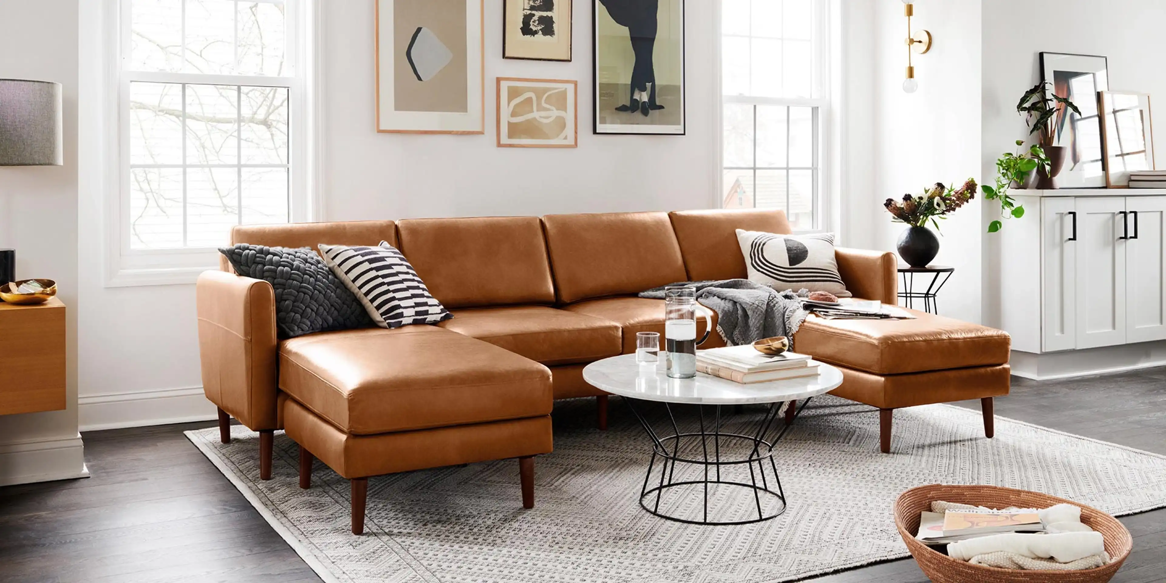 Suburban home living room with Nomad leather double chaise sofa