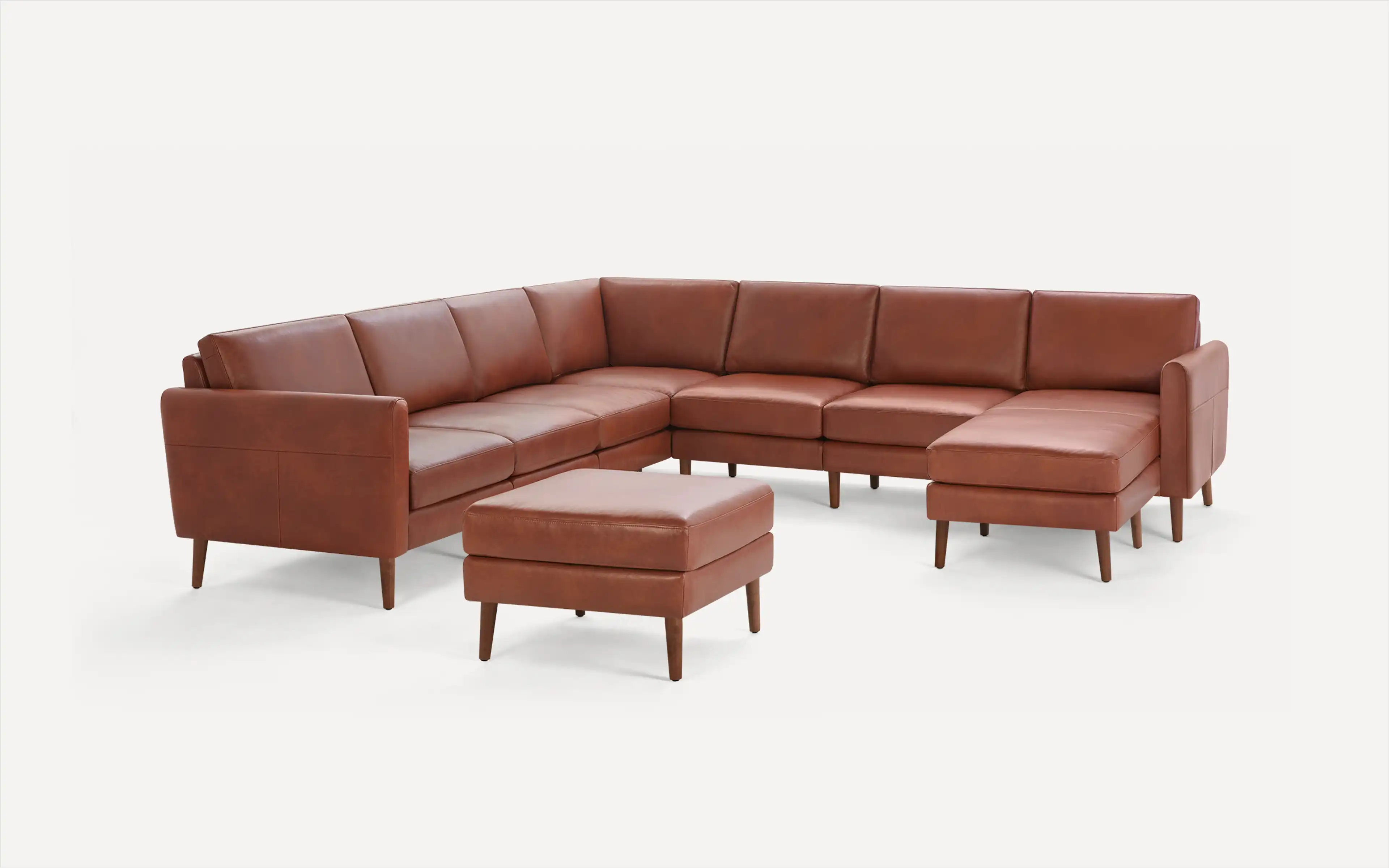 Nomad Leather 7-Seat Corner Sectional with Chaise and Ottoman