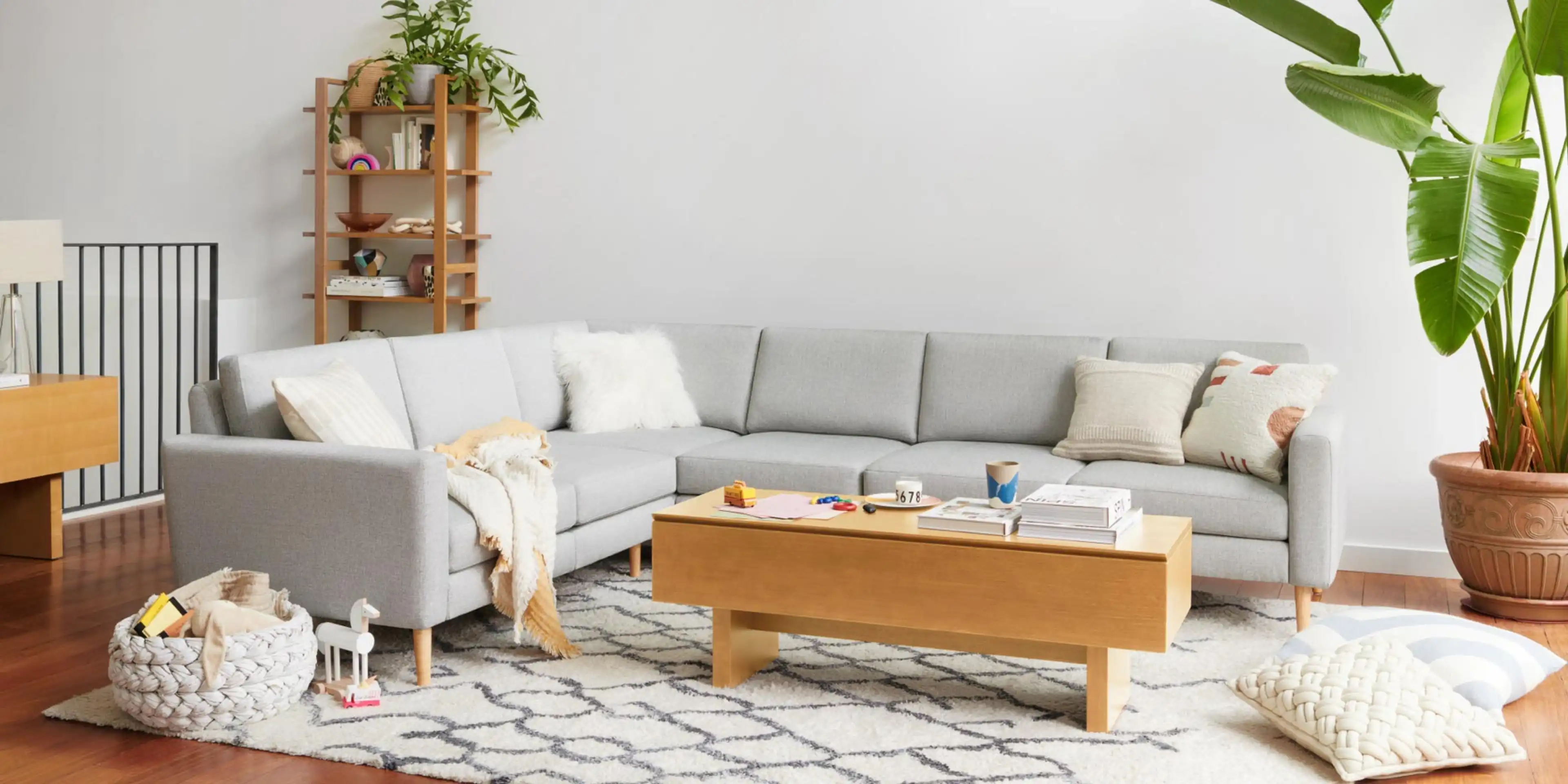 A modern, family-focused living room, with the Nomad sofa in Crushed Gravel