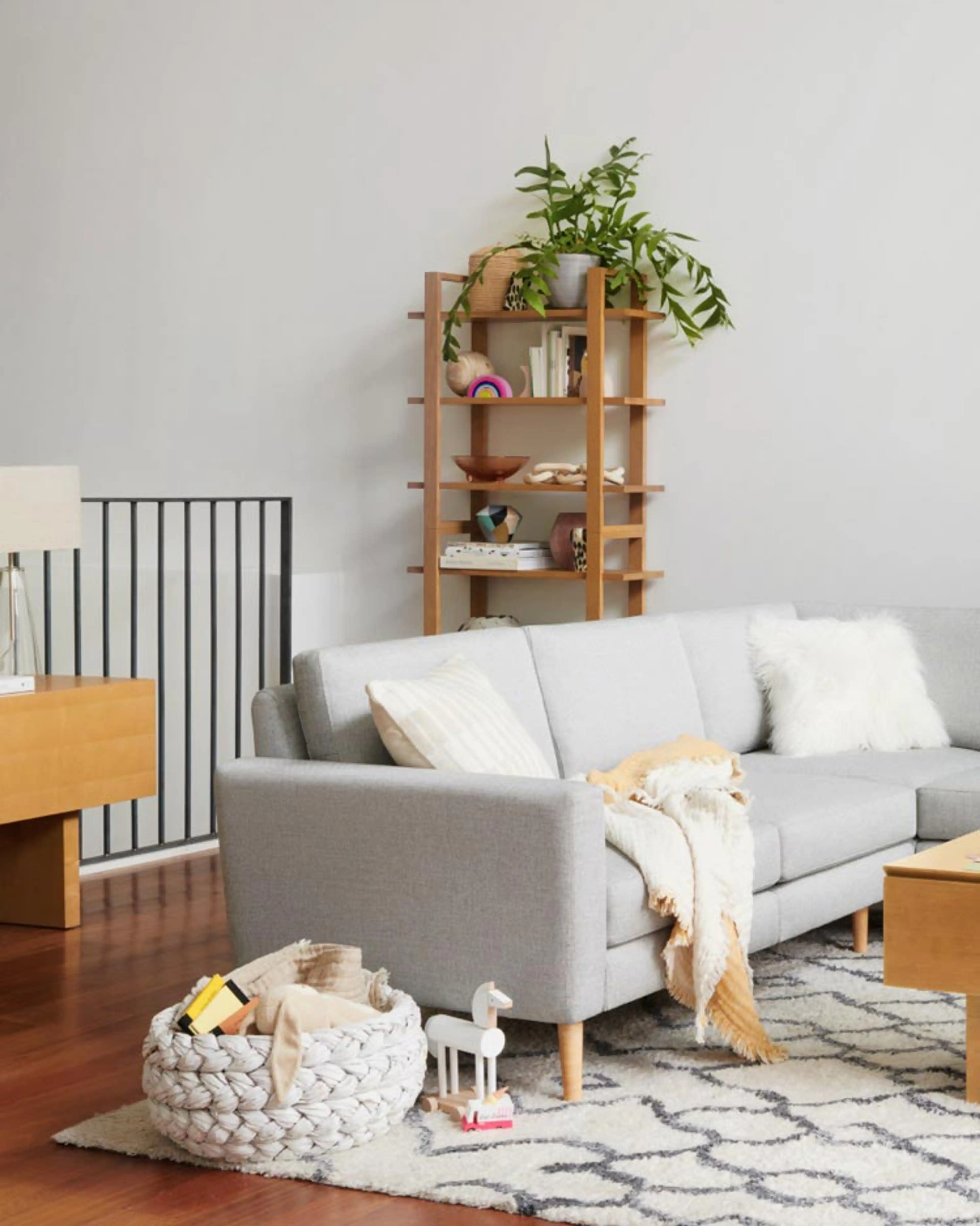 A modern, family-focused living room, with the Nomad sofa in Crushed Gravel