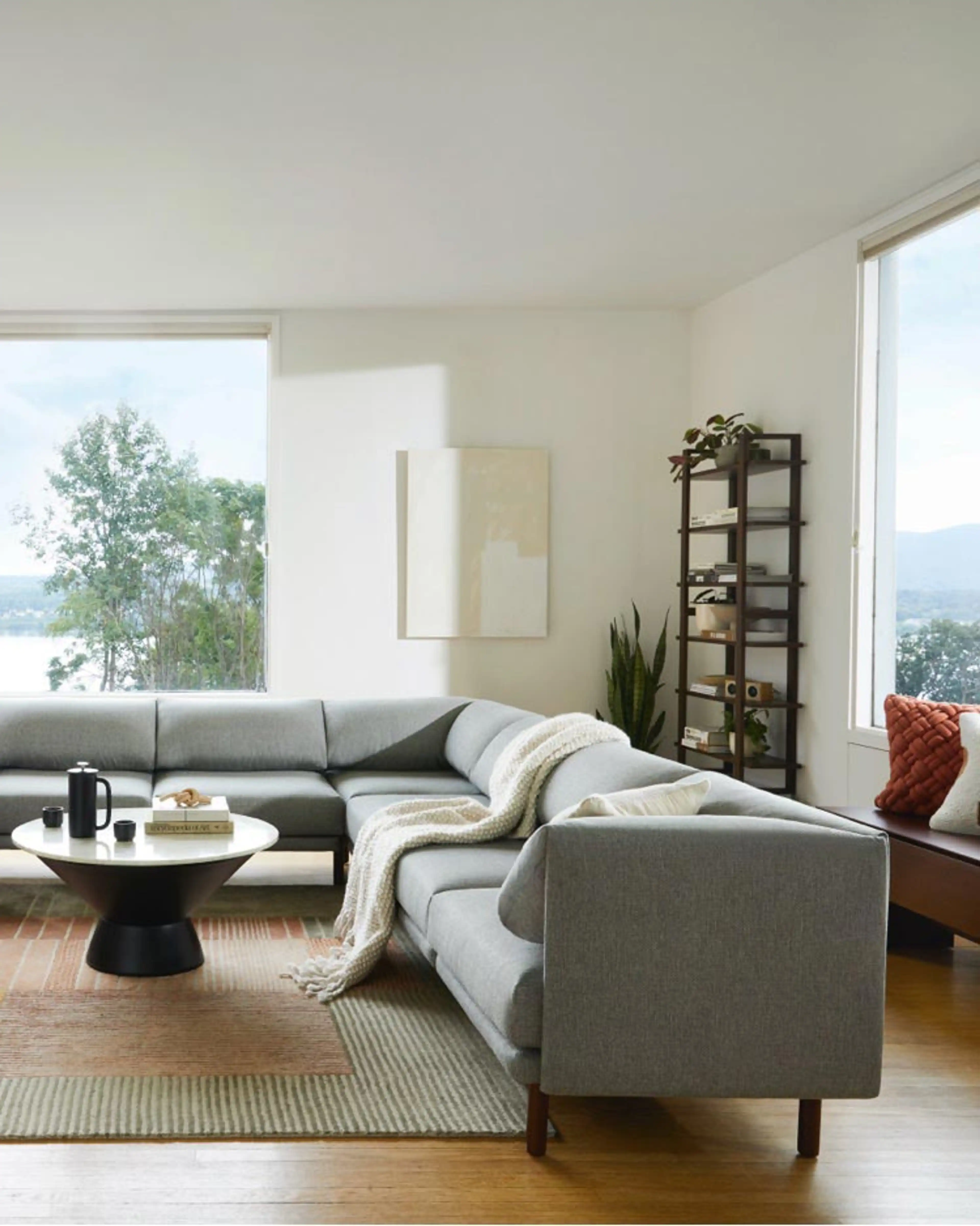 Living room looking out on the Hudson River, with a large Range sectional in Crushed Gravel