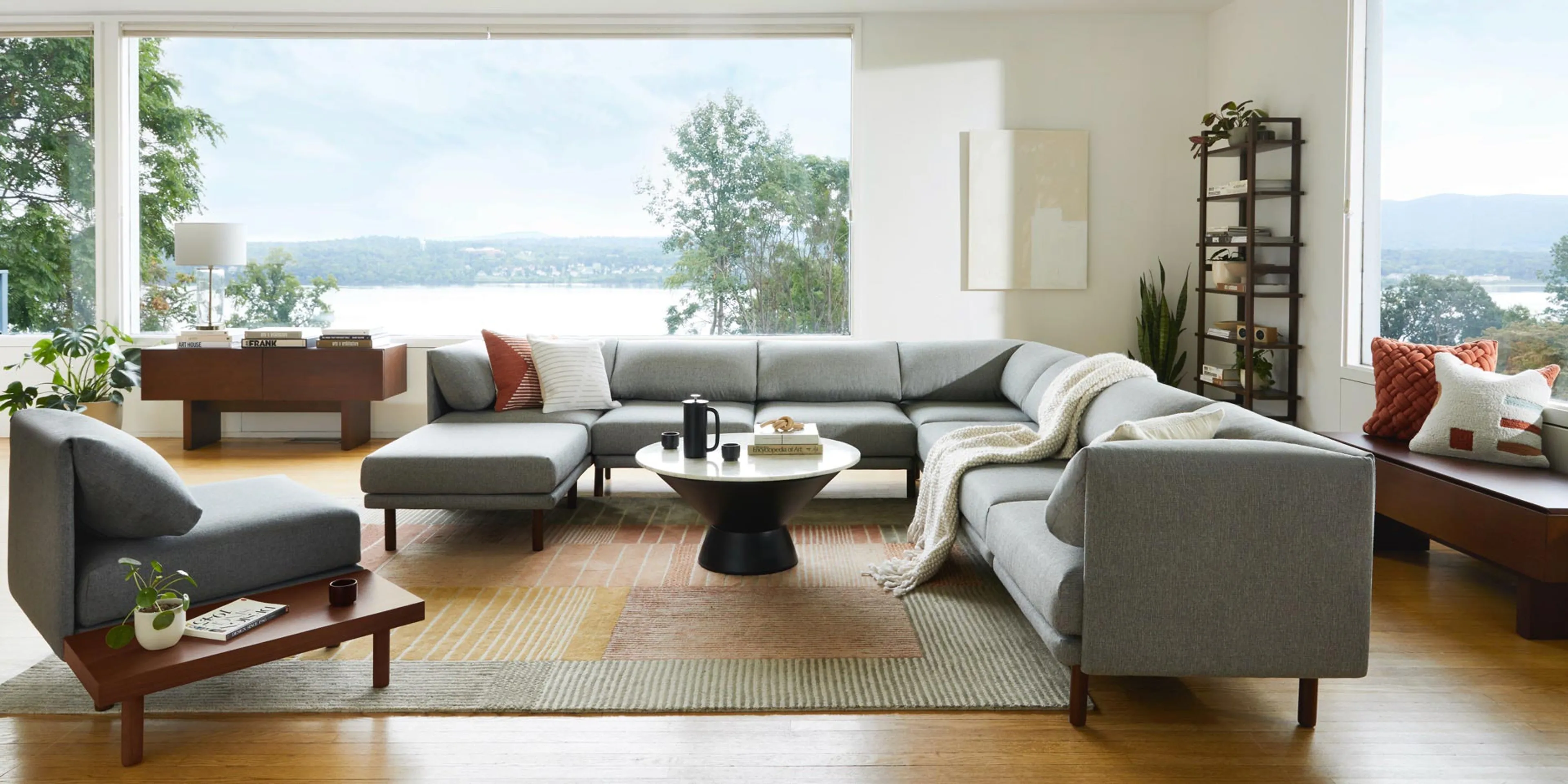 Living room looking out on the Hudson River, with a large Range sectional in Crushed Gravel