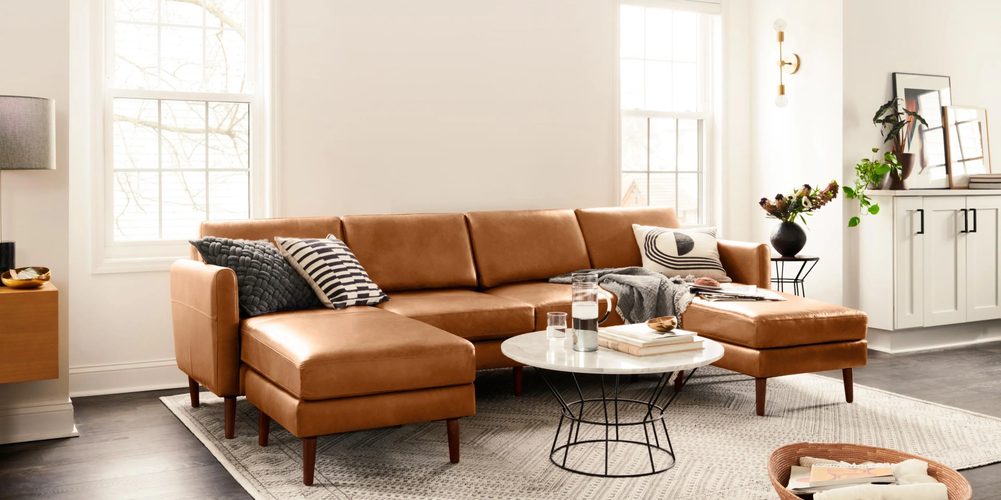 Nomad Leather Sofa in Chestnut looking like a cozy place to relax