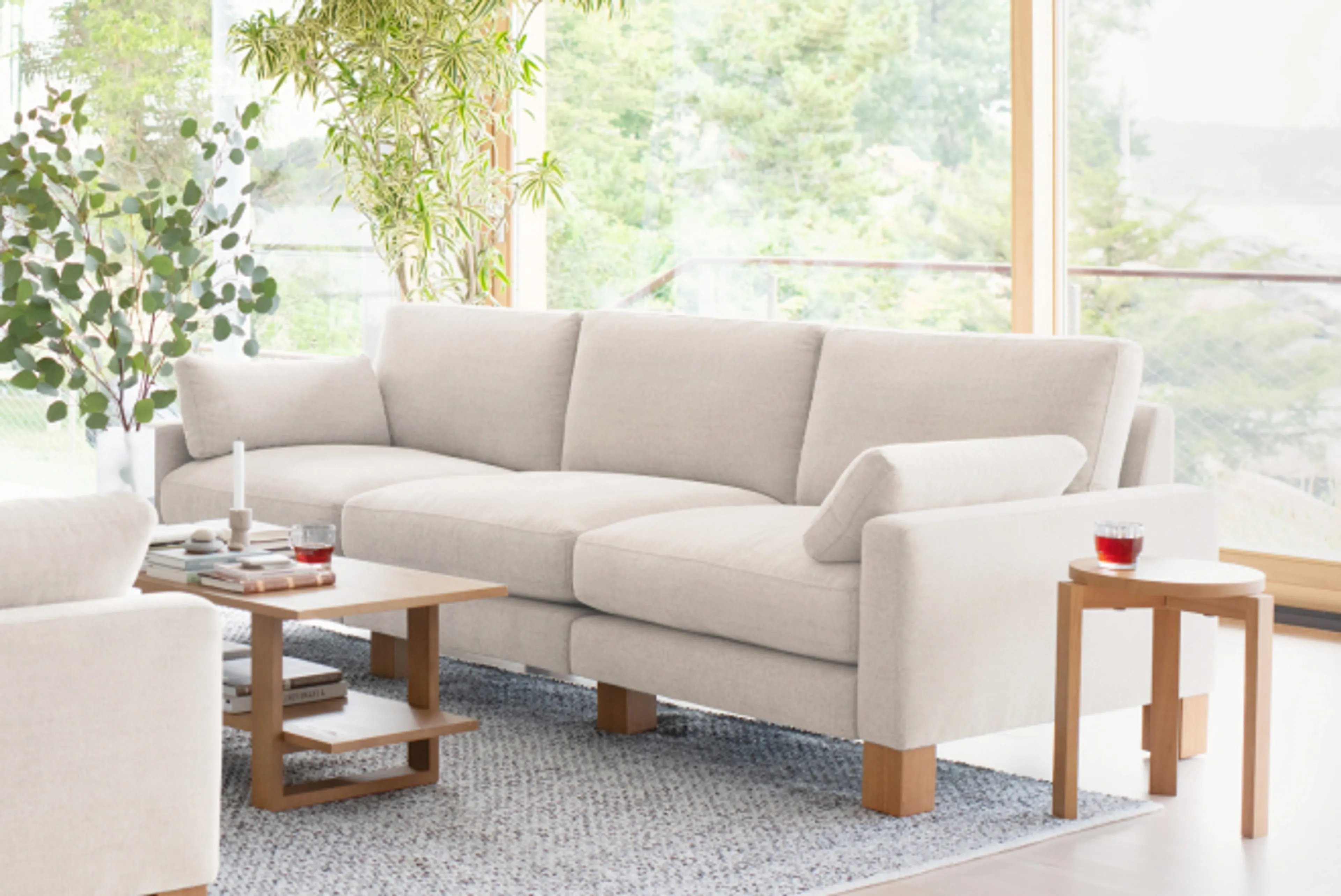 Union sofa in ivory with index stool and index coffee table in living room setting