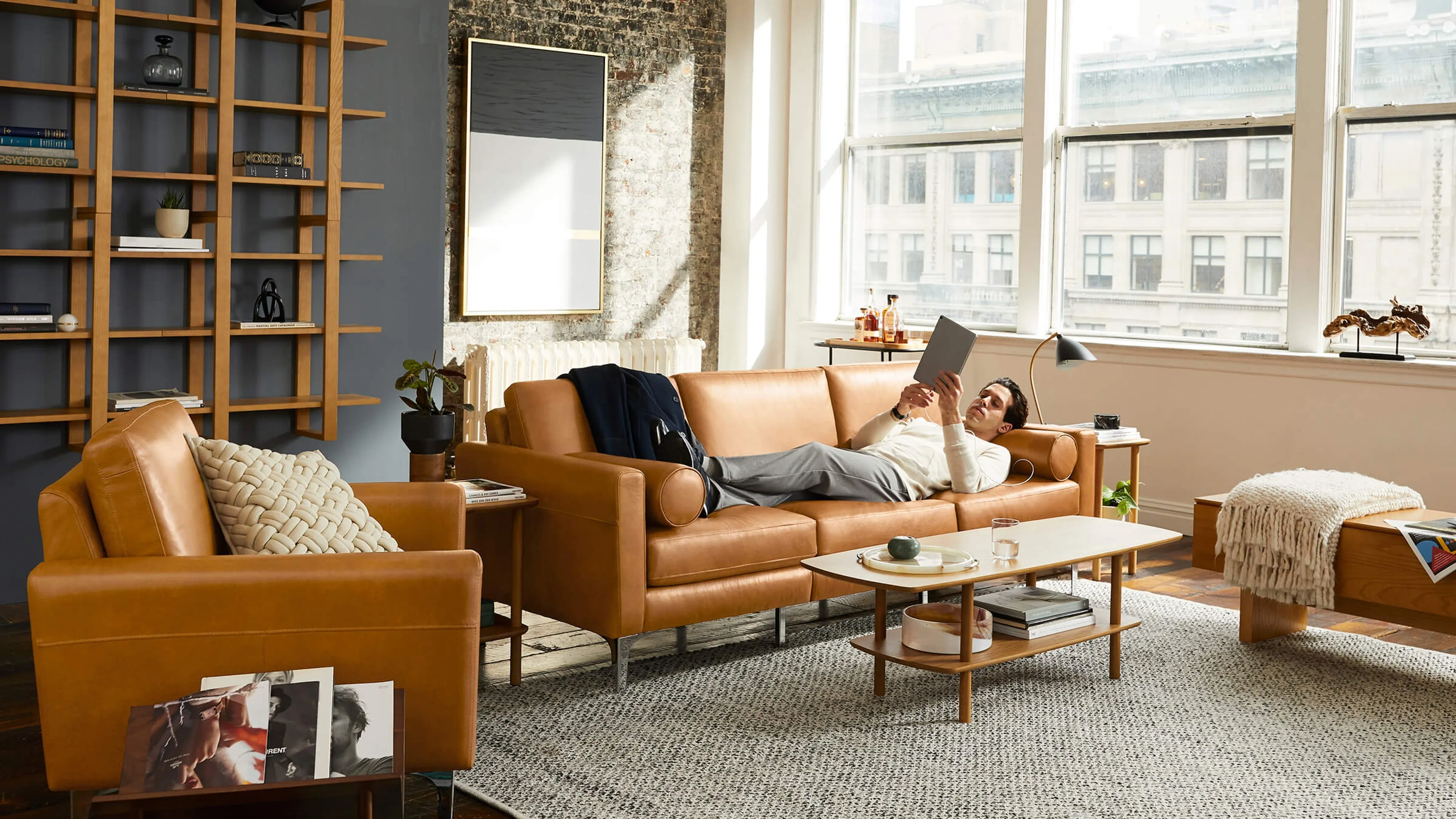 The Nomad Leather Loveseat with Chaise with Ottoman Burrow
