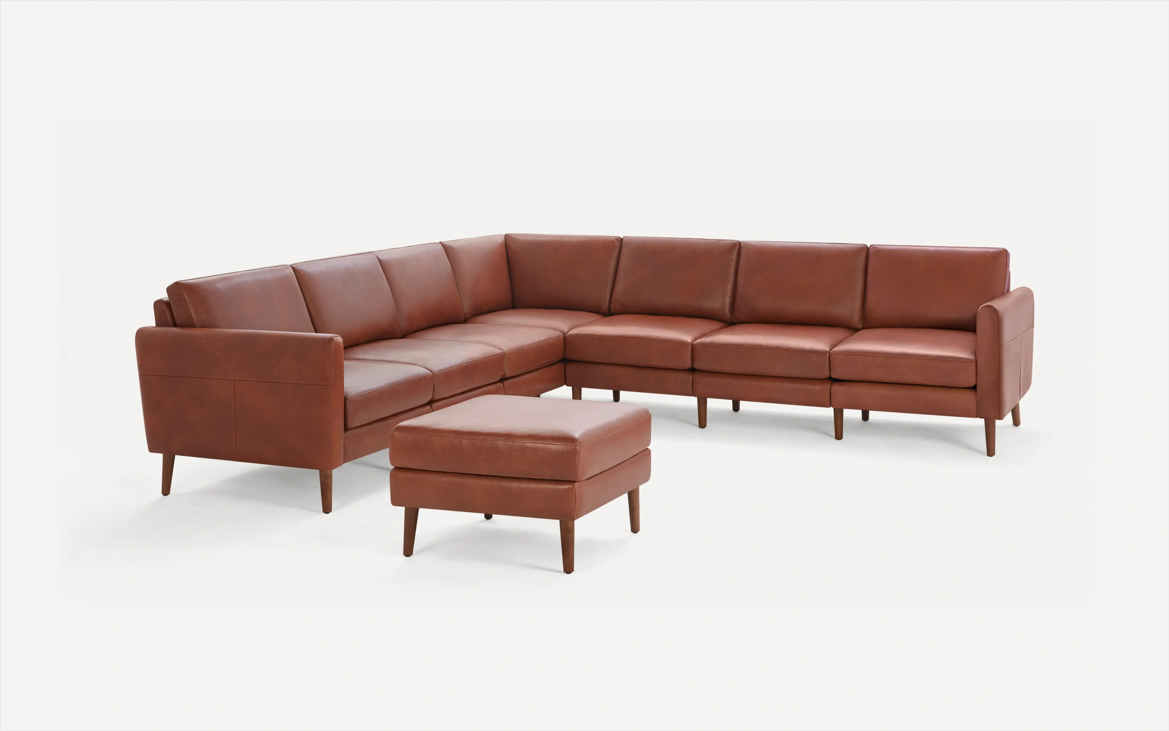 Nomad Leather 7-Seat Corner Sectional with Ottoman