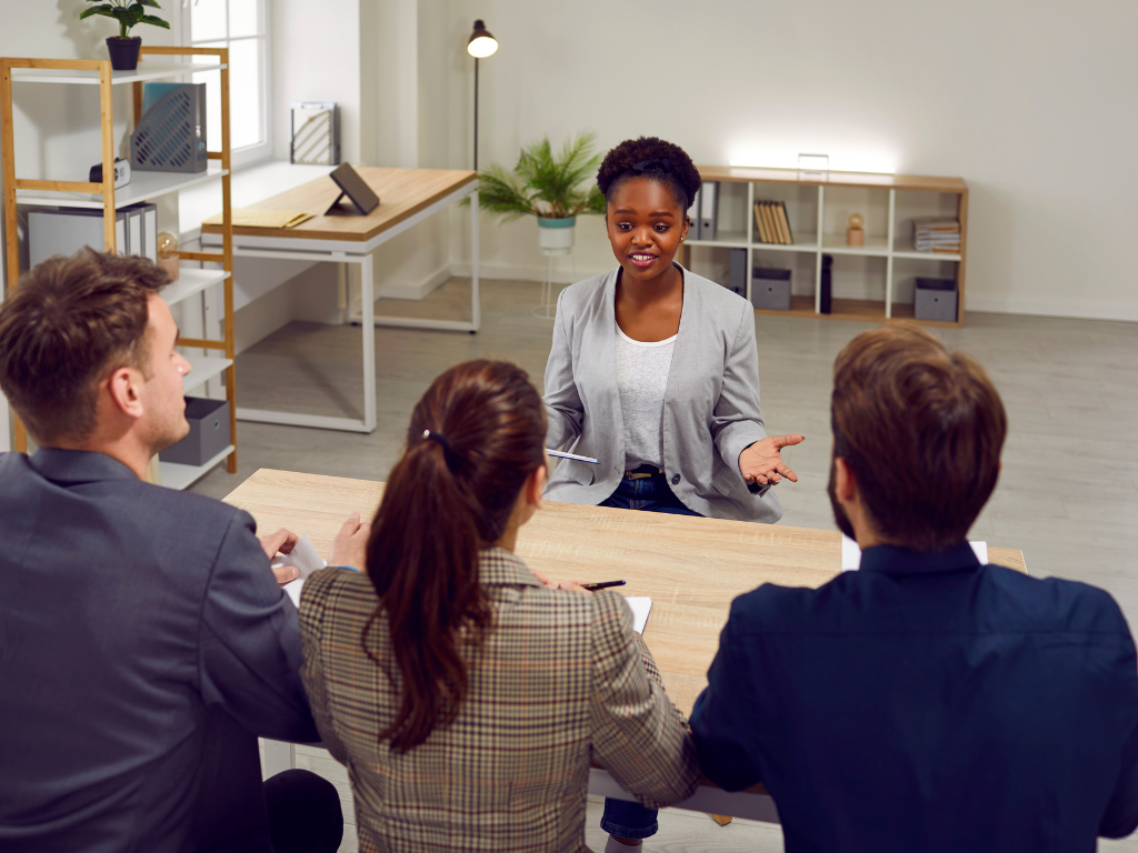 a woman presenting herself at a job interview