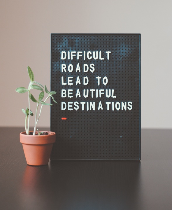 inspiring quote that says how difficult roads lead to beautiful destinations