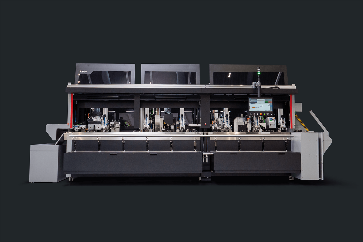 Highvoltage cable assembly From nail scissors and toothbrush method to full automation Komax