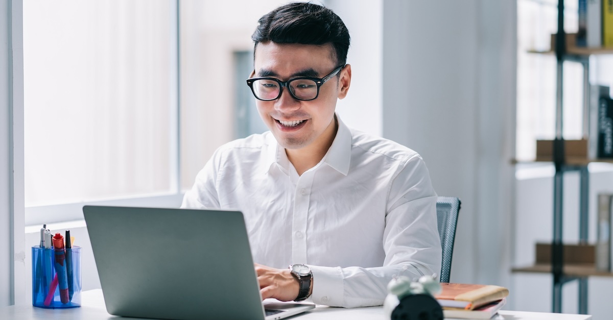 business man at work in a white shirt at his home office