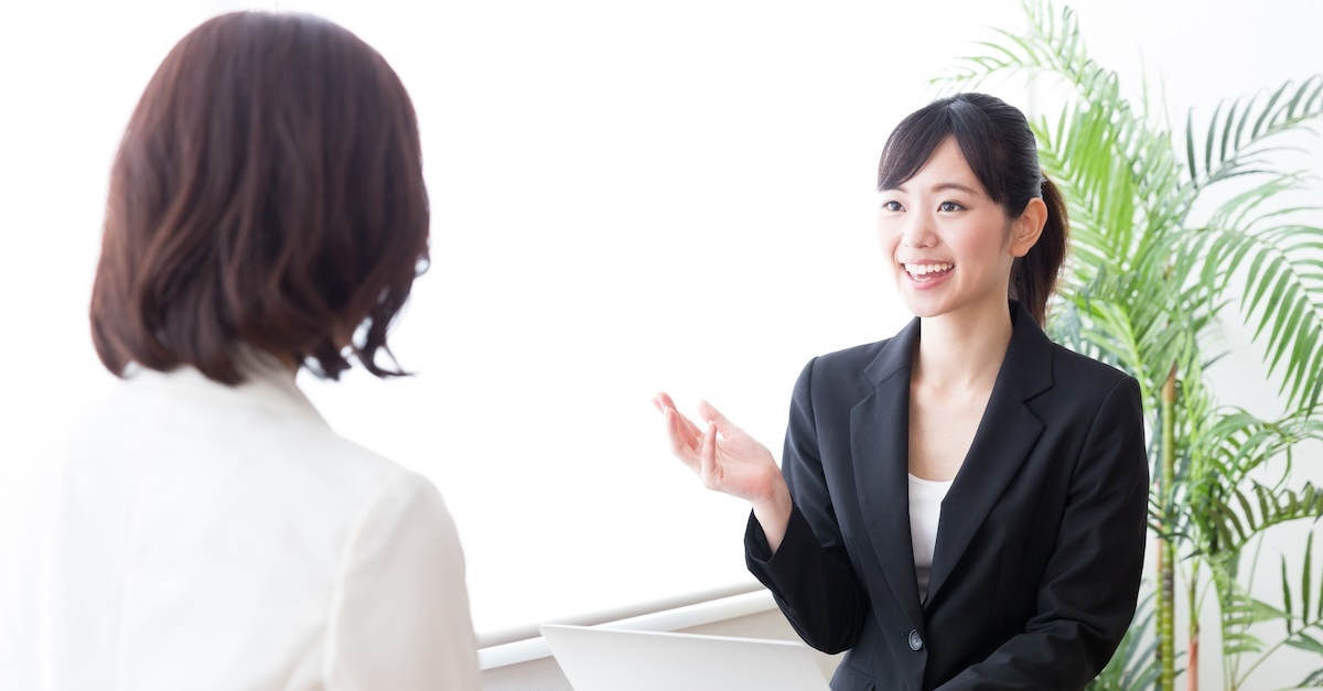 two women in an interview in a business setting