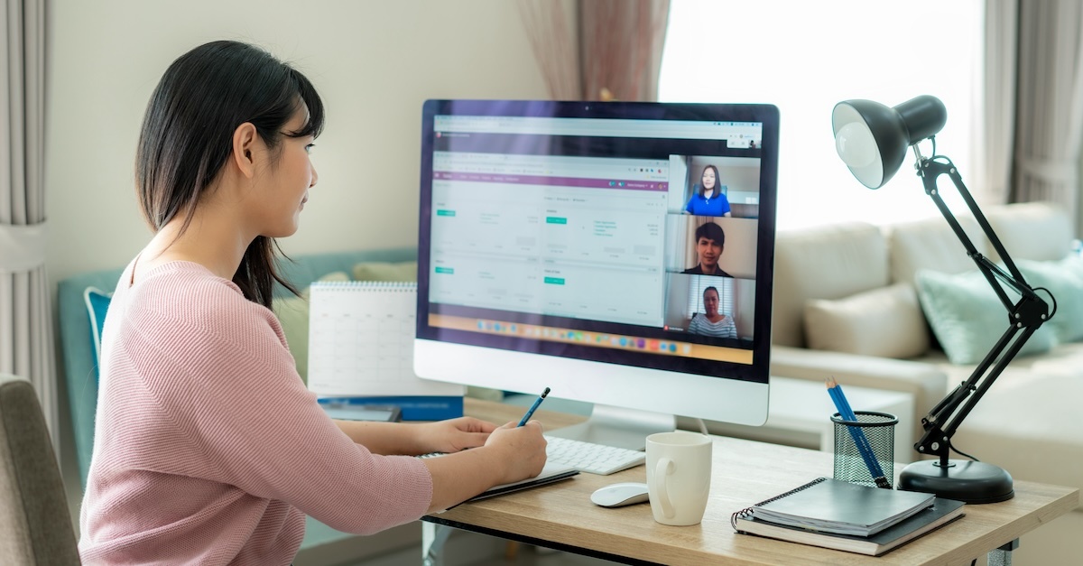 Woman working from home in an online meeting