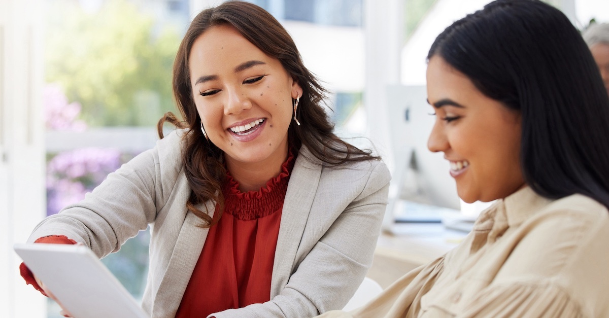 two women on a tablet