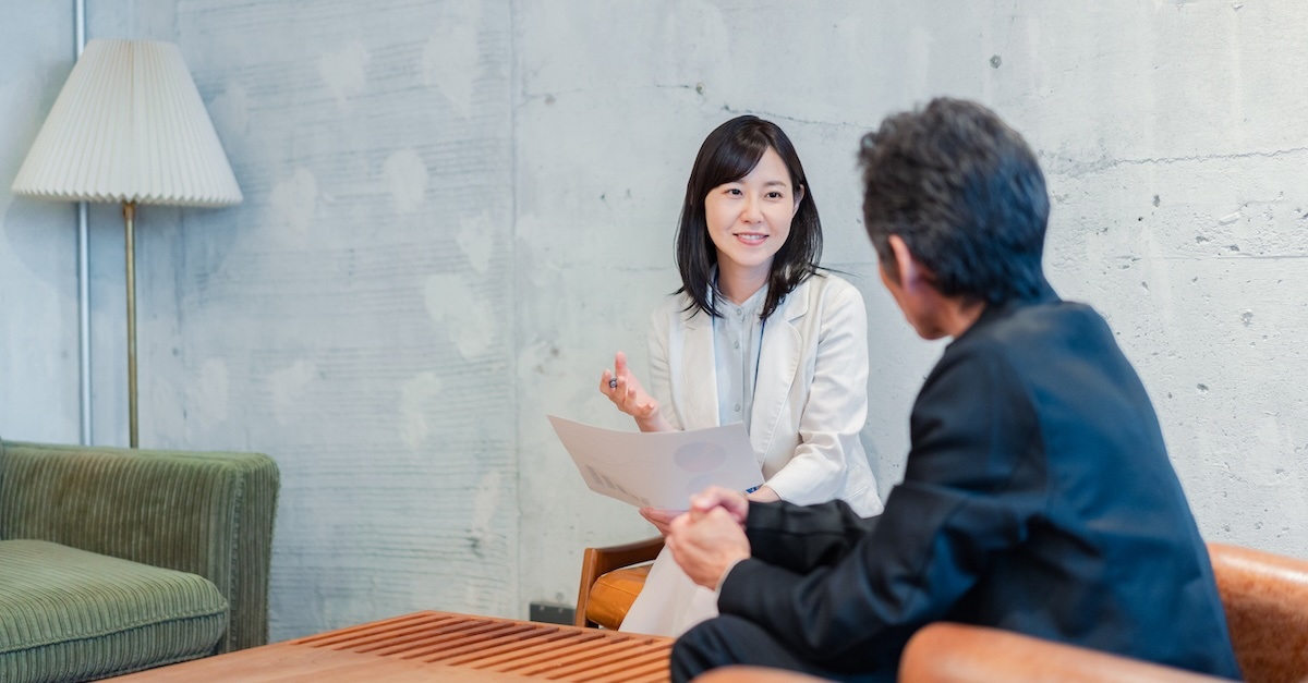 Woman interviewing a man