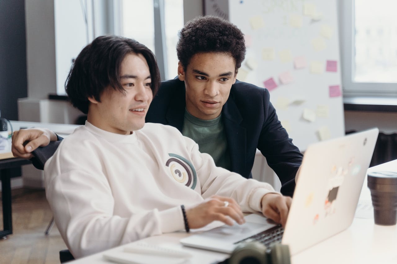 Employees crafting good congratulations messages or congratulations emails to officemates