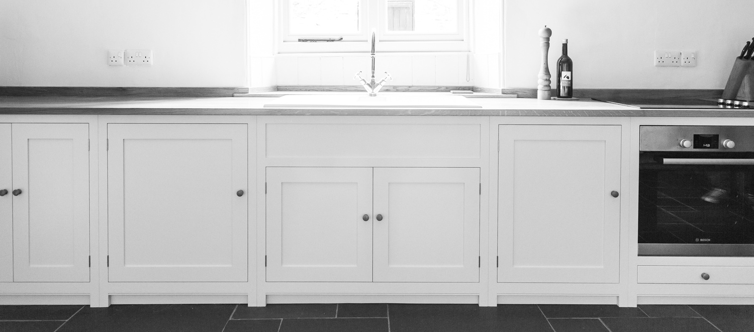 Shaker style kitchen, hand-painted, full-stave Oak worktops, dovetailed draws running on full extension runners