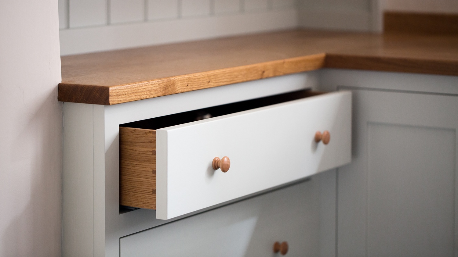 Shaker style kitchen, hand-painted, full-stave Oak worktops, dovetailed draws running on full extension runners