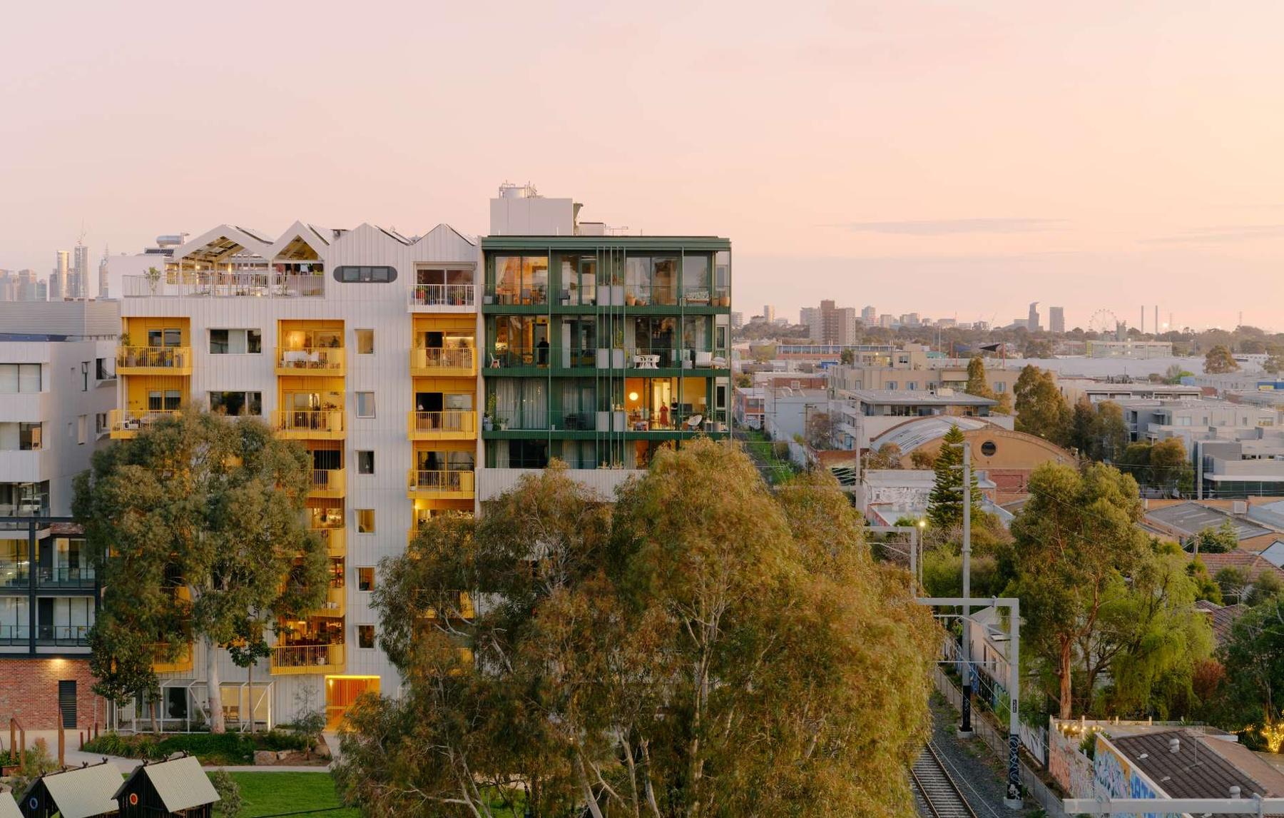 Nightingale ParkLife (Austin Maynard Architects) and Nightingale Evergreen (Clare Cousins Architects) apartment buildings and the surrounding urban context in Melbourne. 