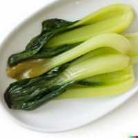 Marinated bok choy on a white, oval plate