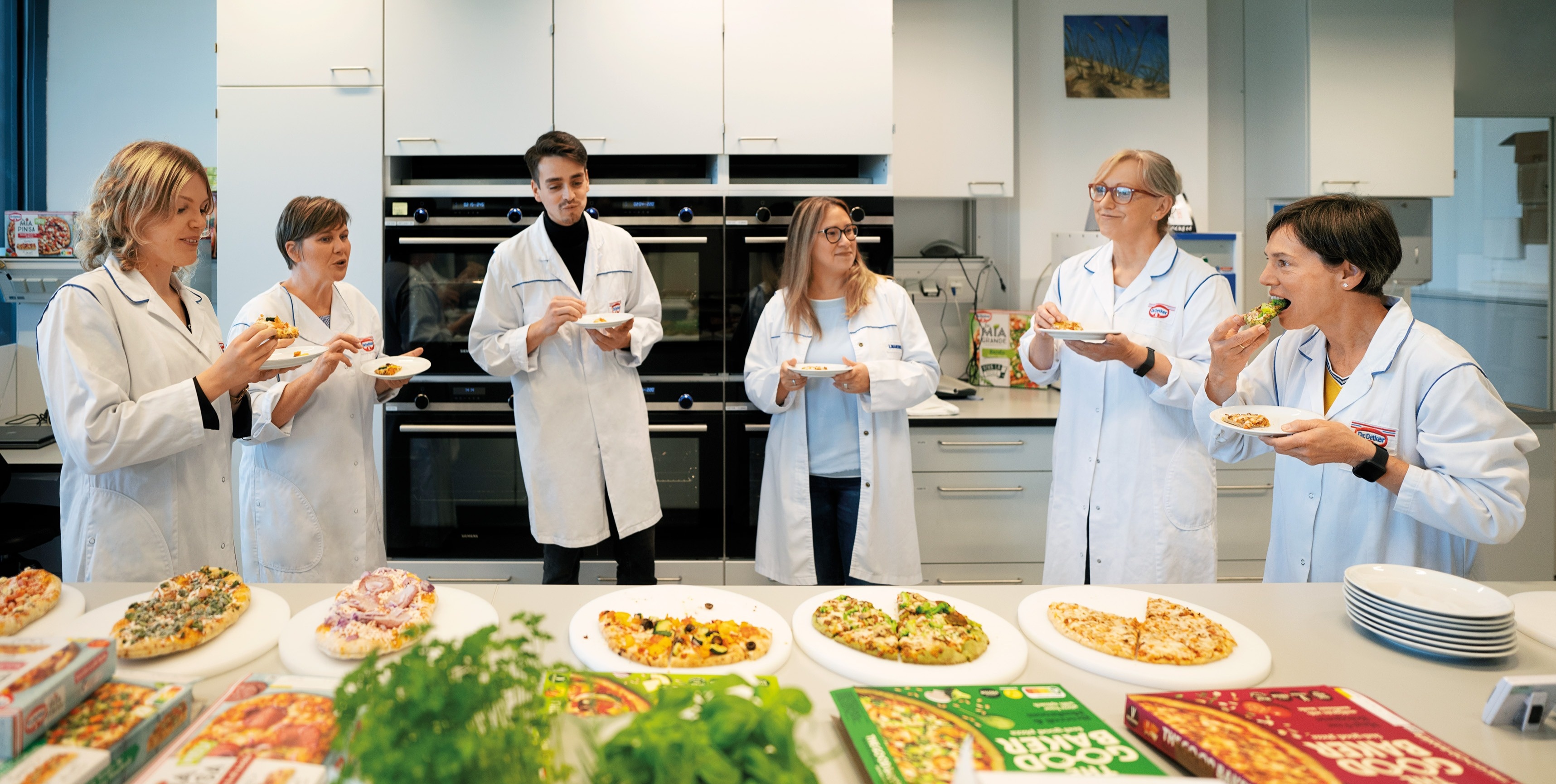 Dr. Oetker employees standing in a test kitchen