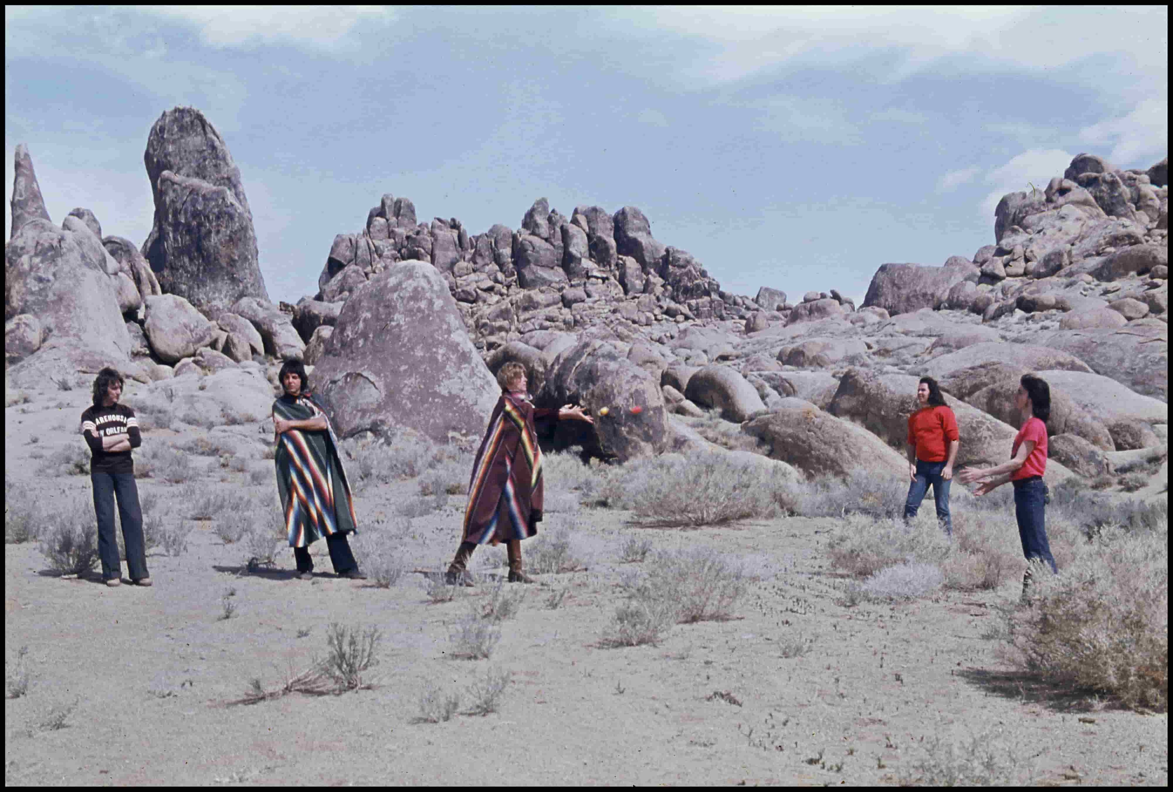 Wings band members stand apart in the desert