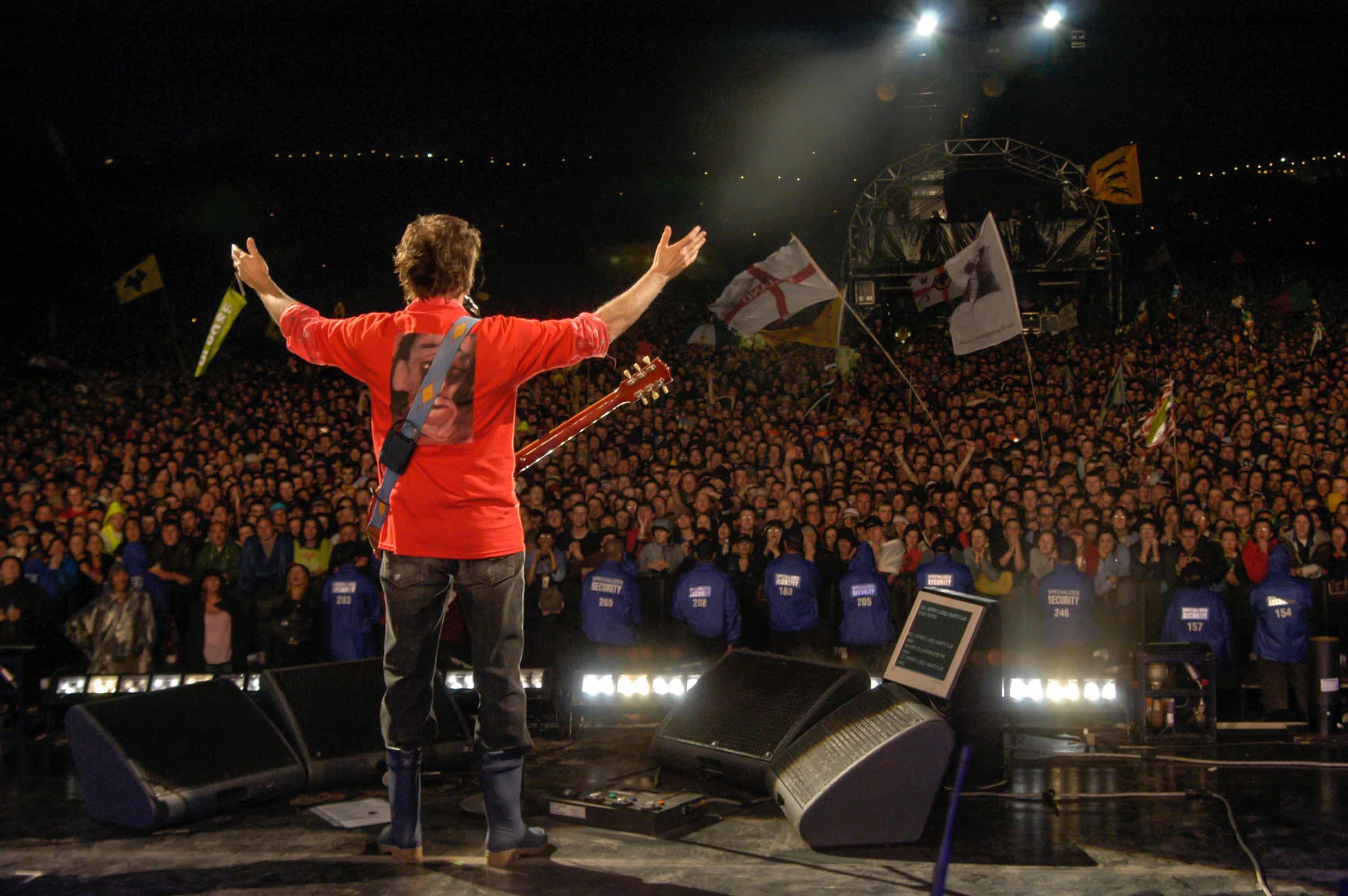 Photo of Paul performing at Glastonbury in 2004
