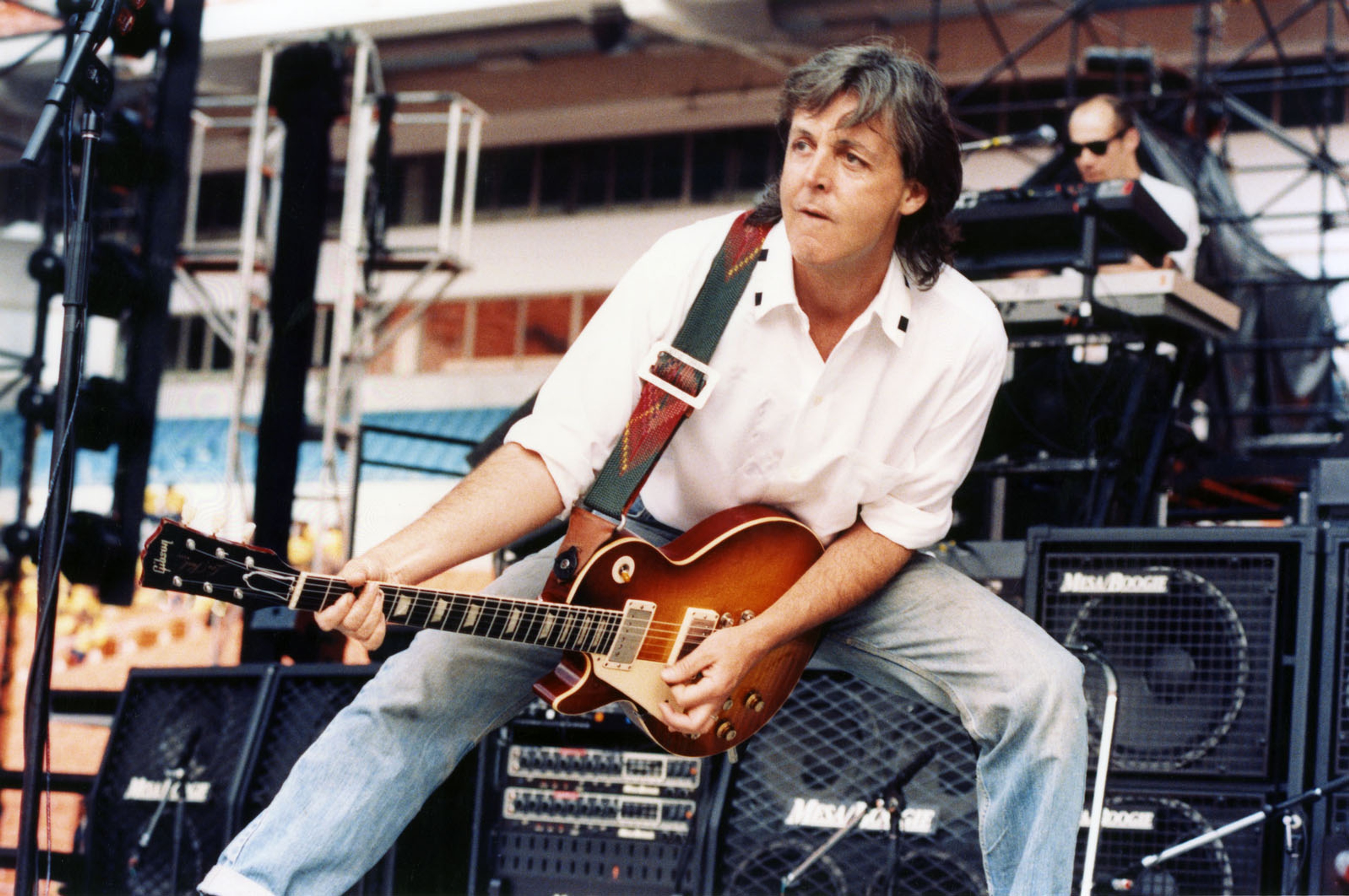 Photo of Paul playing guitar during the 1989/1990 Paul McCartnery World Tour