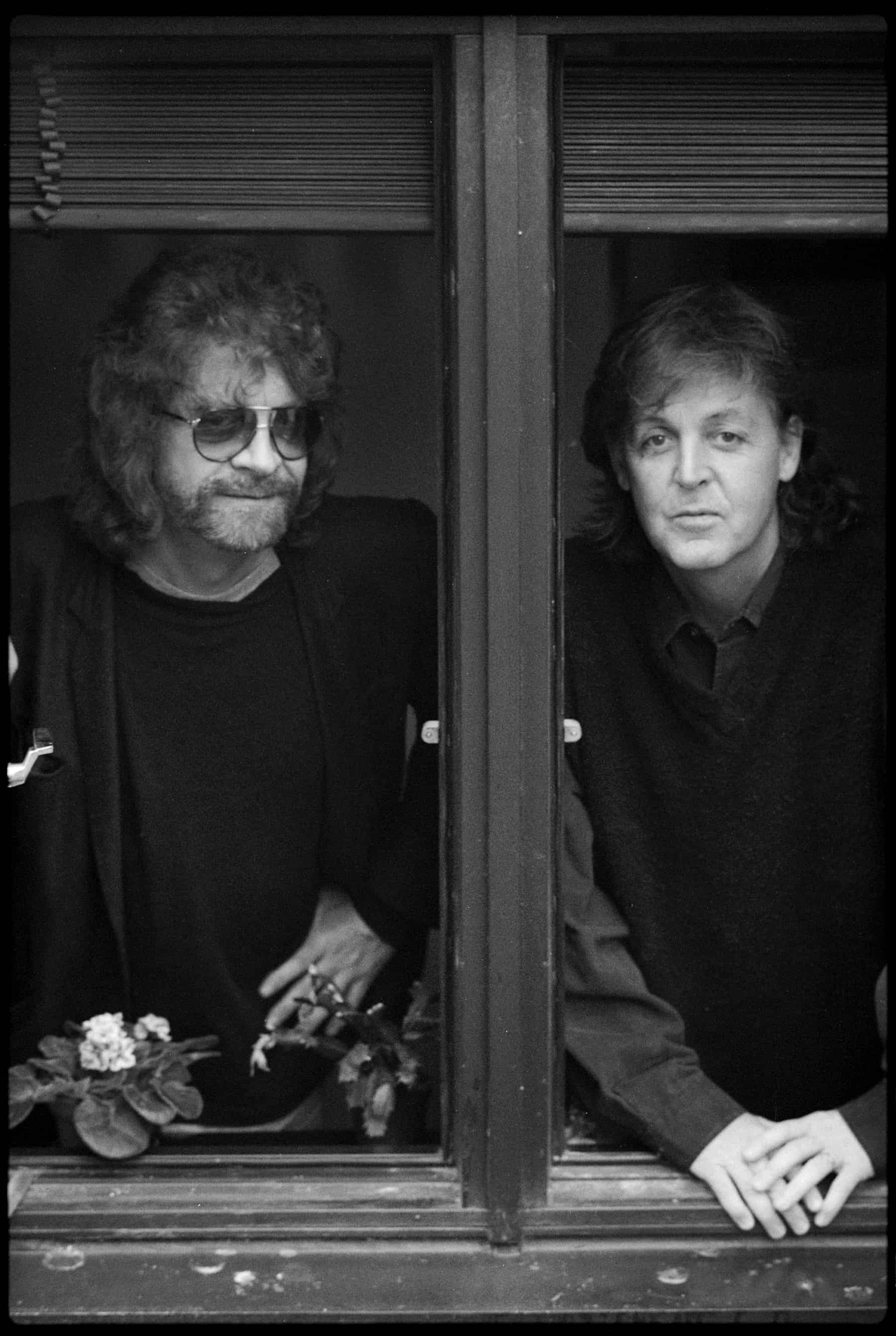 A black and white photo of Paul McCartney and Jeff Lynne during the recording sessions for 'Flaming Pie'