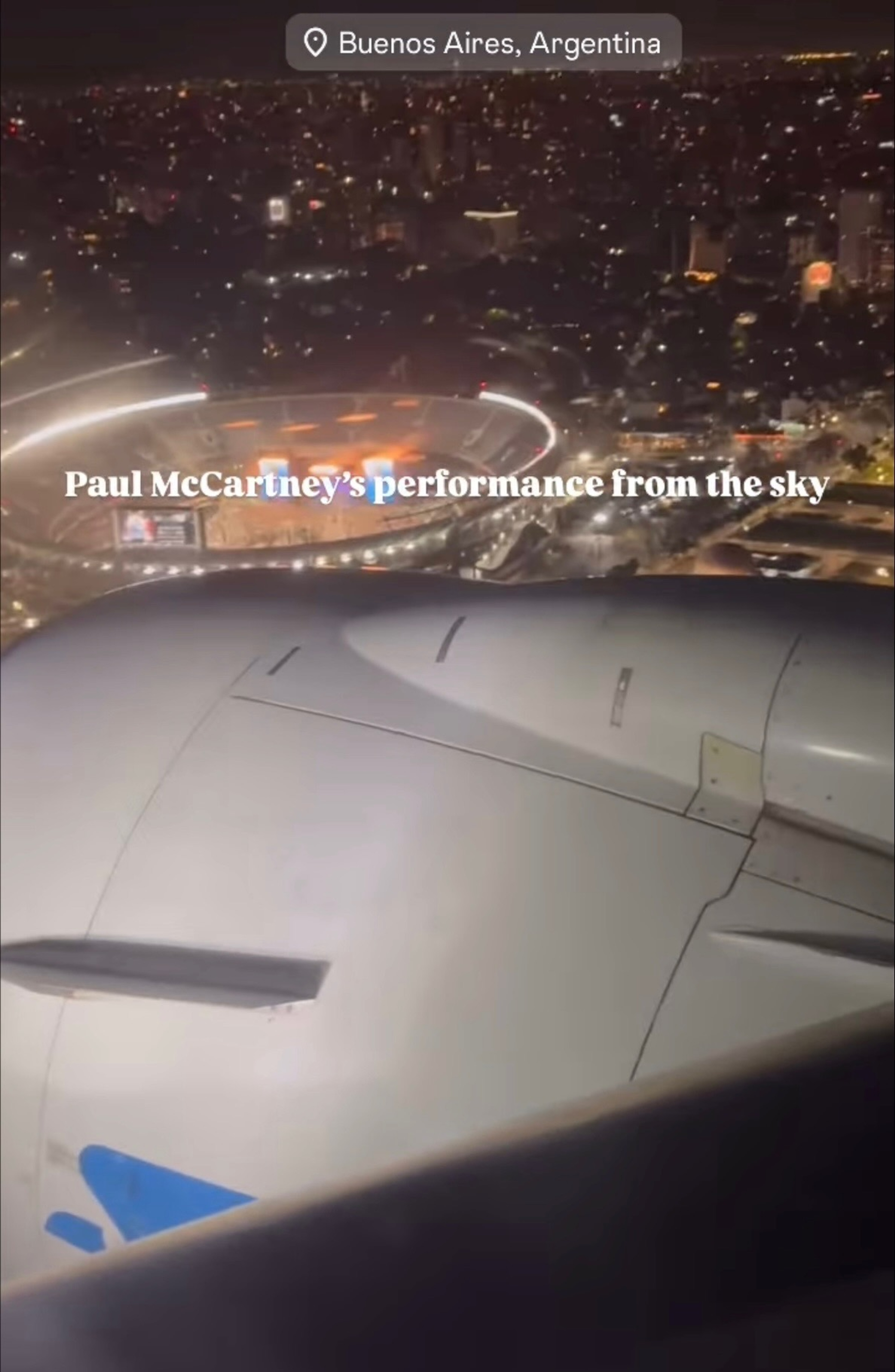 Photo of Paul performing at Buenos Aires River Plate Stadium from the window of a plane passing by.