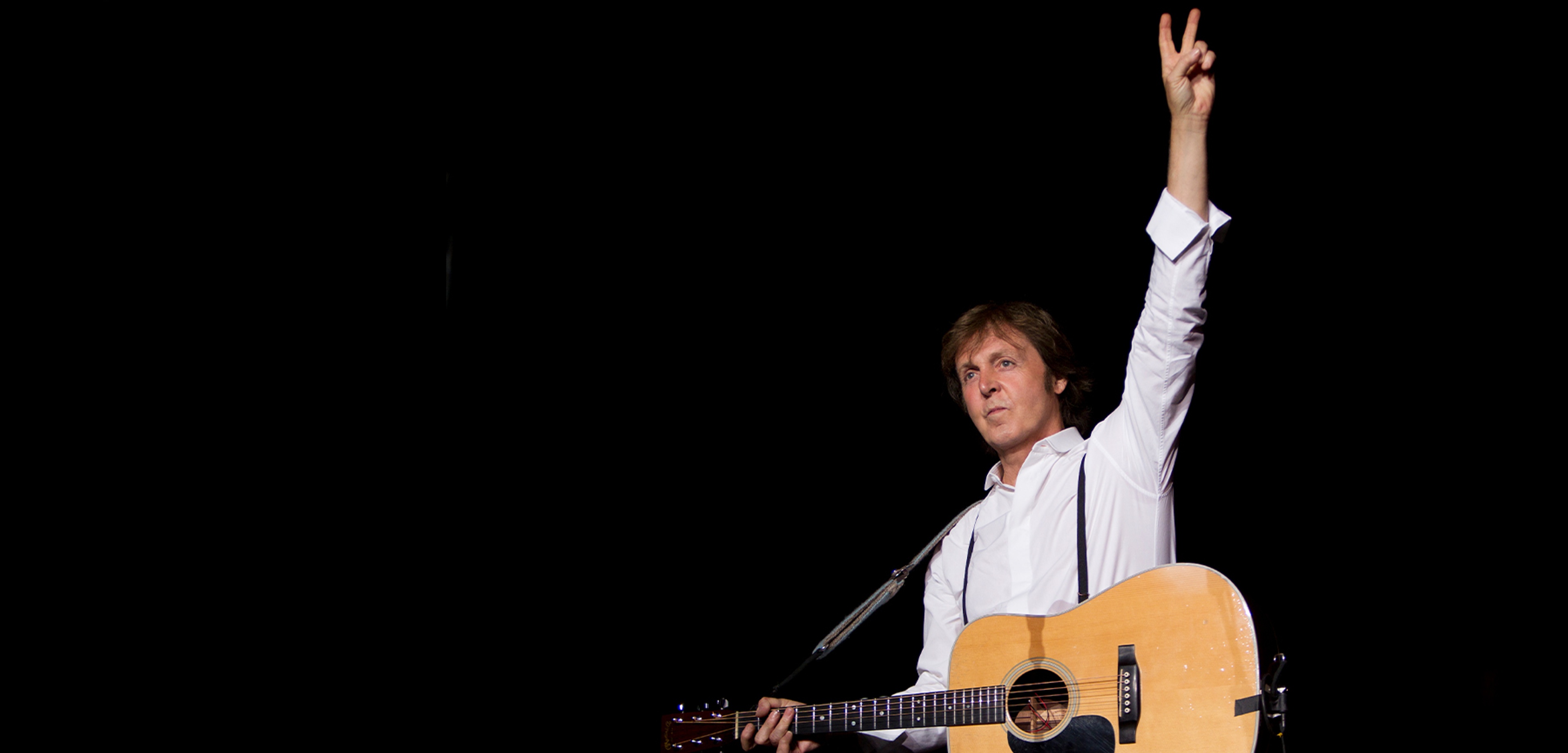 Photo of Paul throwing a peace sign used on 'On The Run' promotional assets