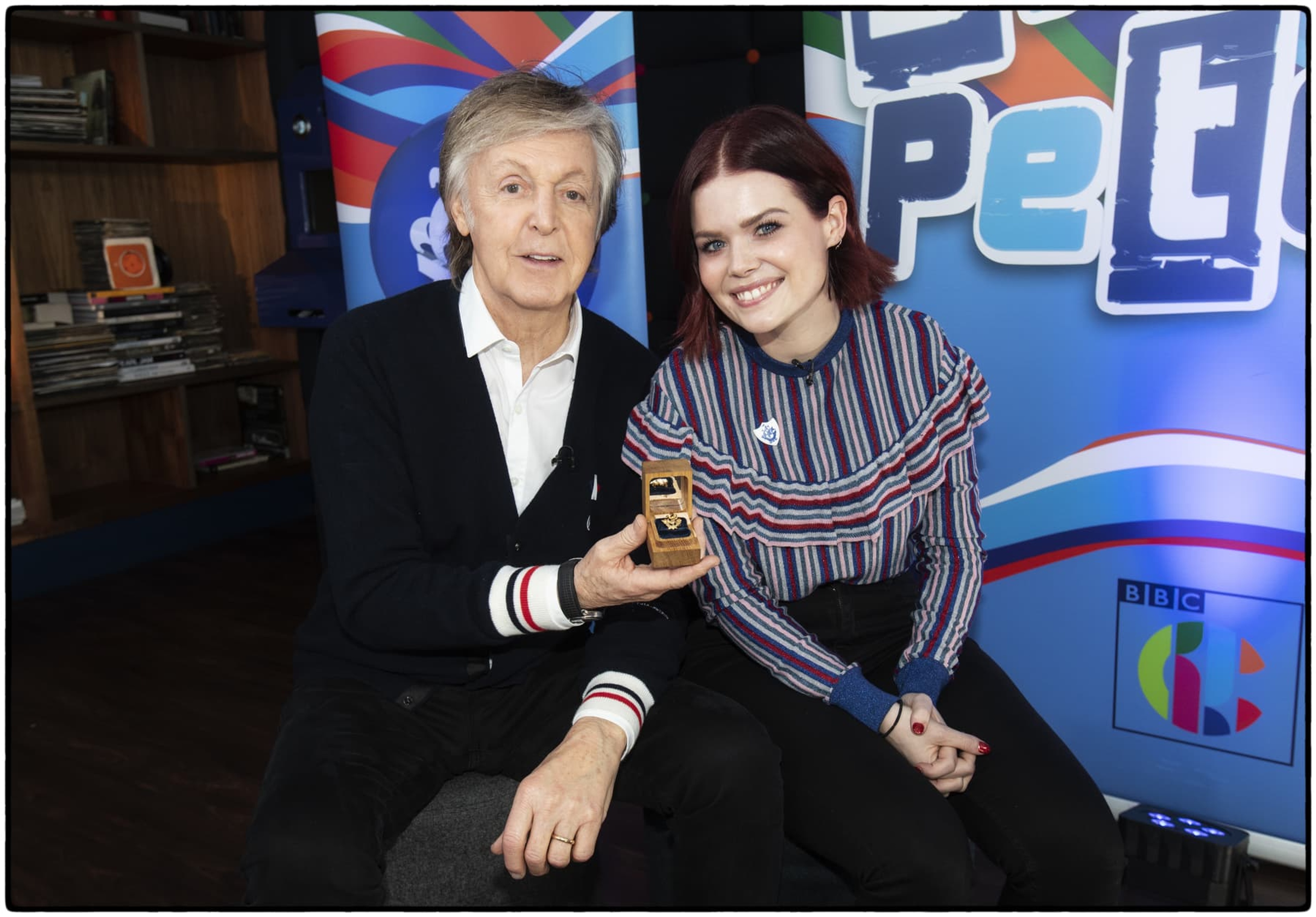 Photo of Paul with Blue Peter presenter Lindsey Russell receiving his Gold Blue Peter Badge