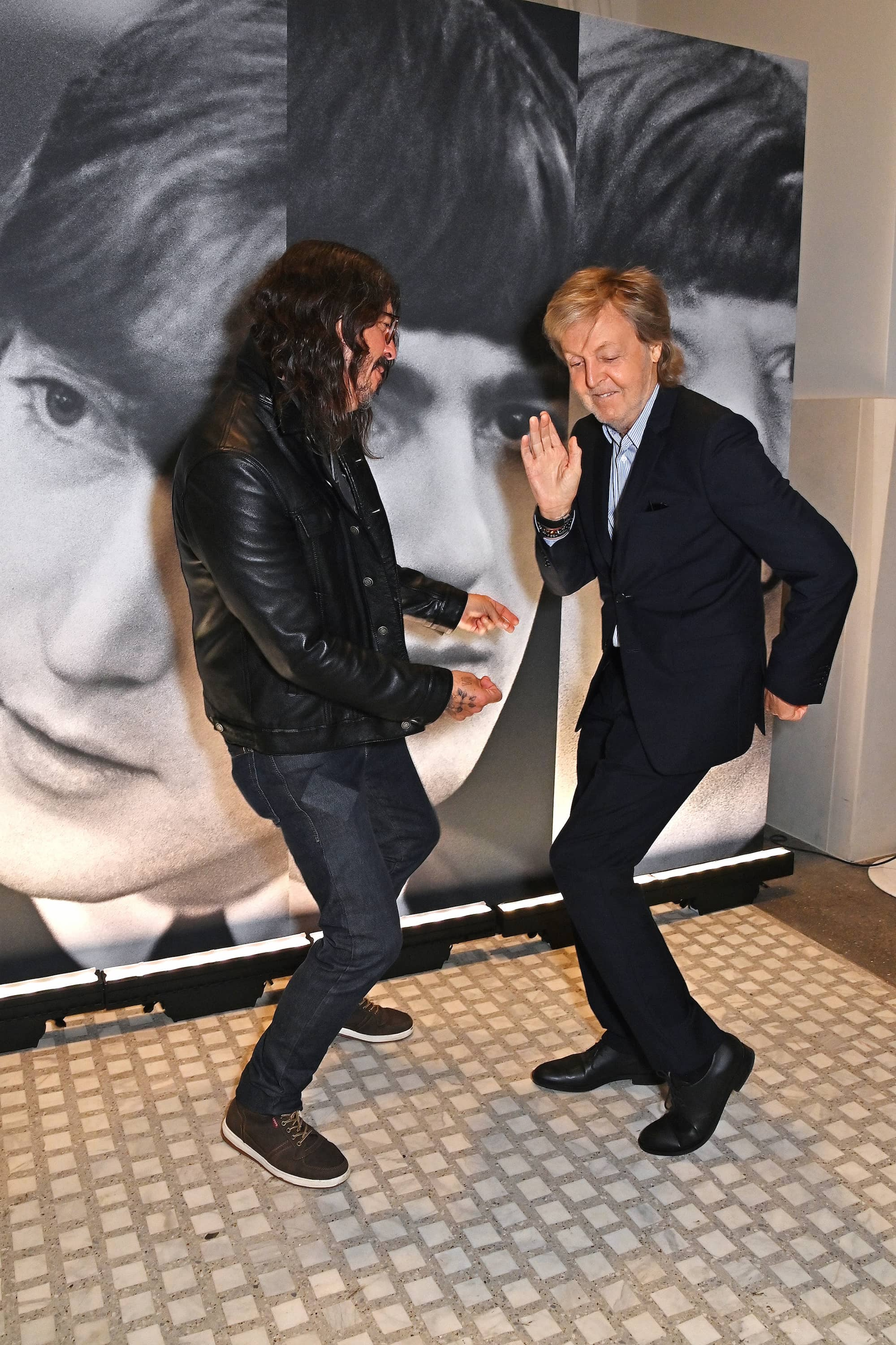 Photograph of Paul McCartney and Dave Grohl at the opening preview night of Paul's exhibition at the National Portrait Gallery