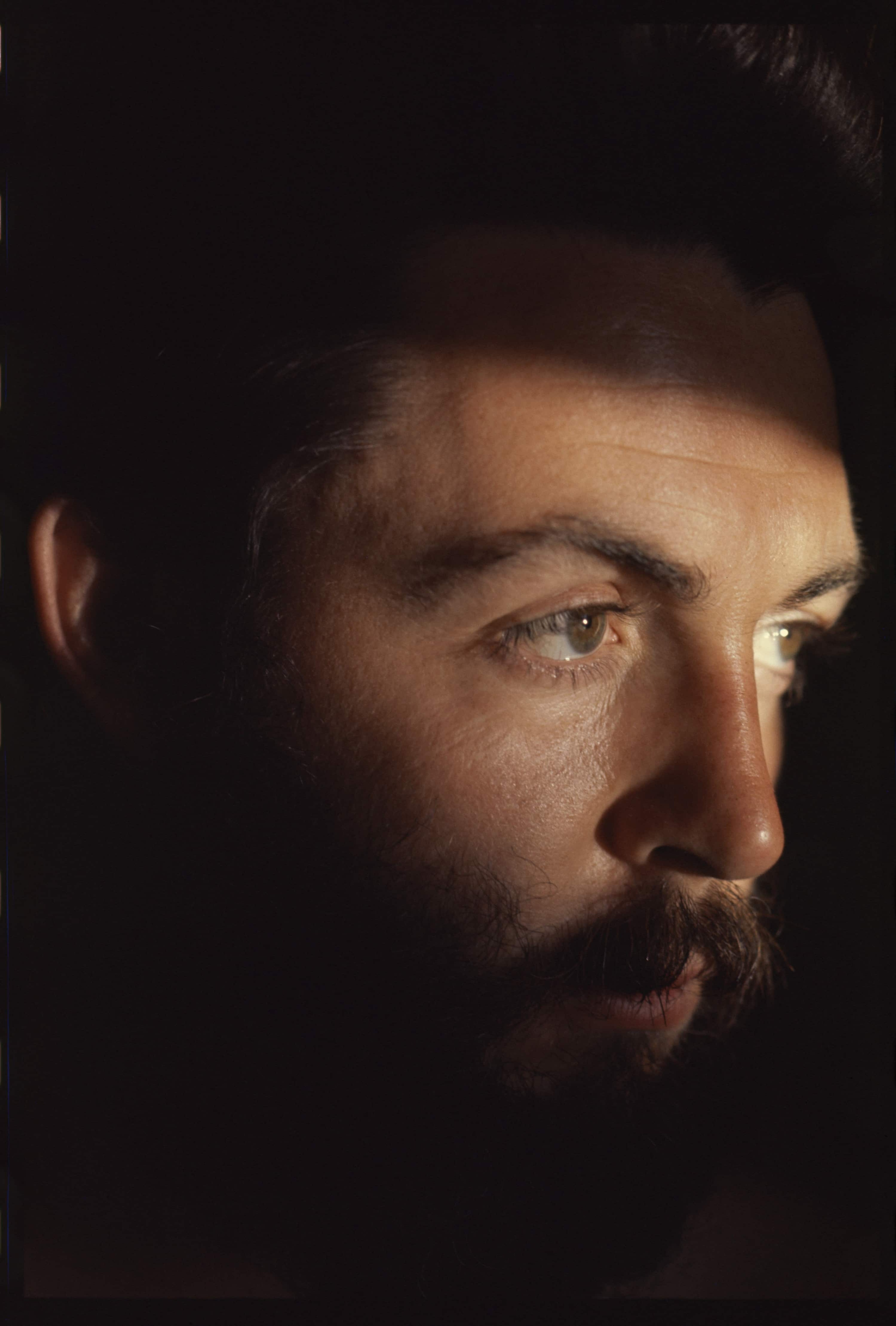 Portrait photo of Paul McCartney with Sunlight across his face