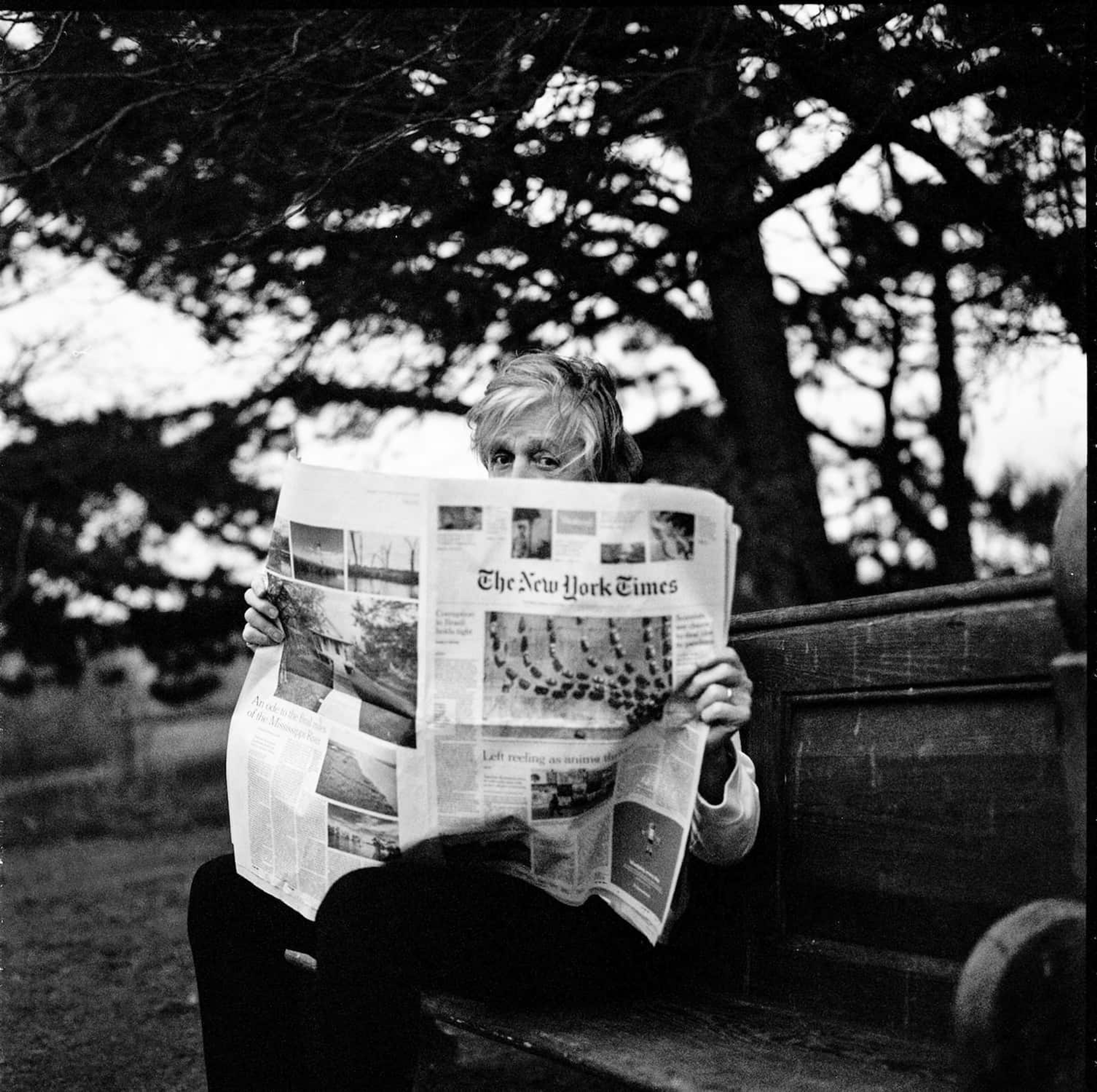 Photo of Paul reading the New York Times as featured in 'The Kiss of Venus (Dominic Fike)' music video