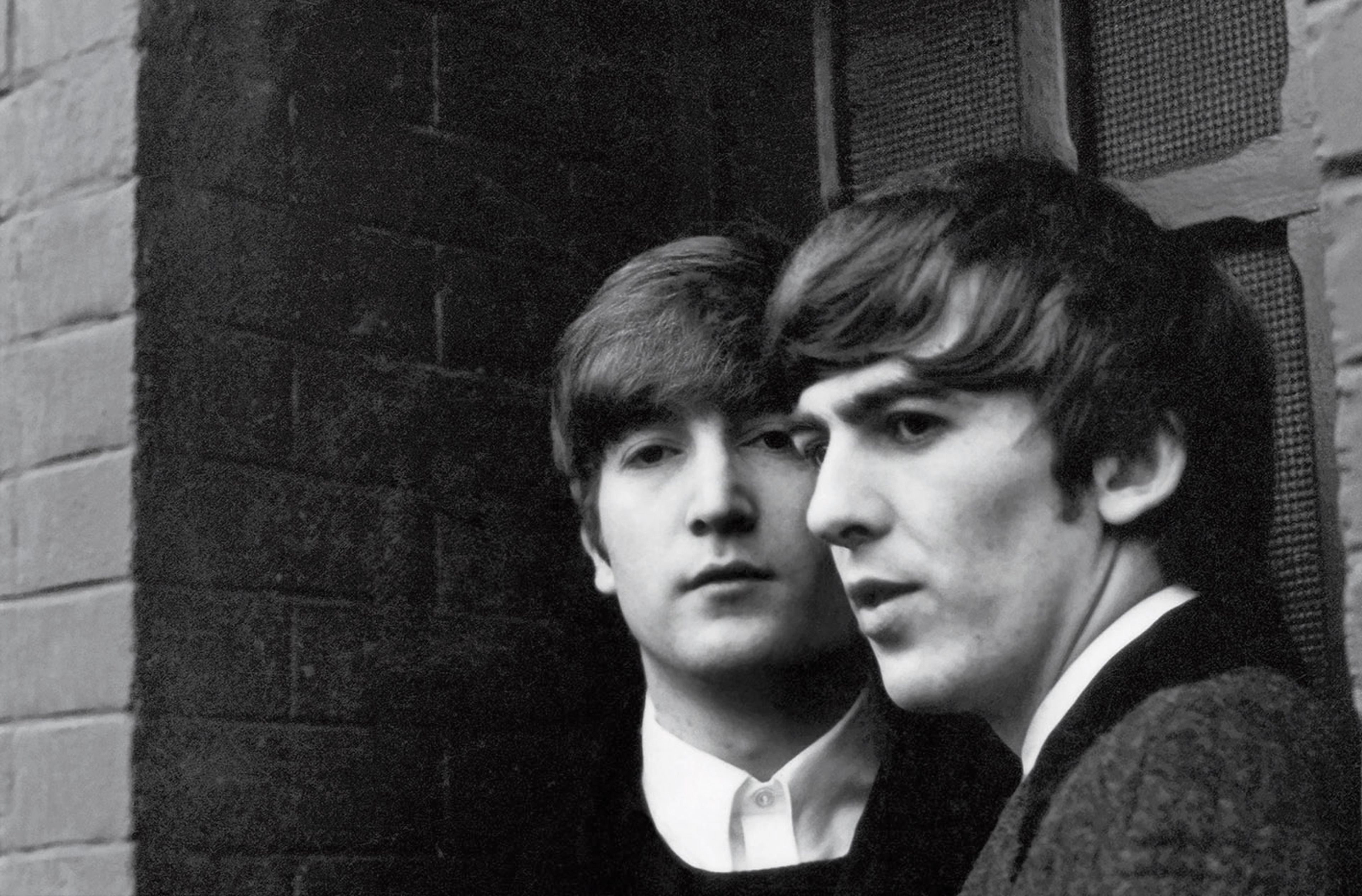 Black and white photograph of John Lennon and George Harrison taken by Paul McCartney