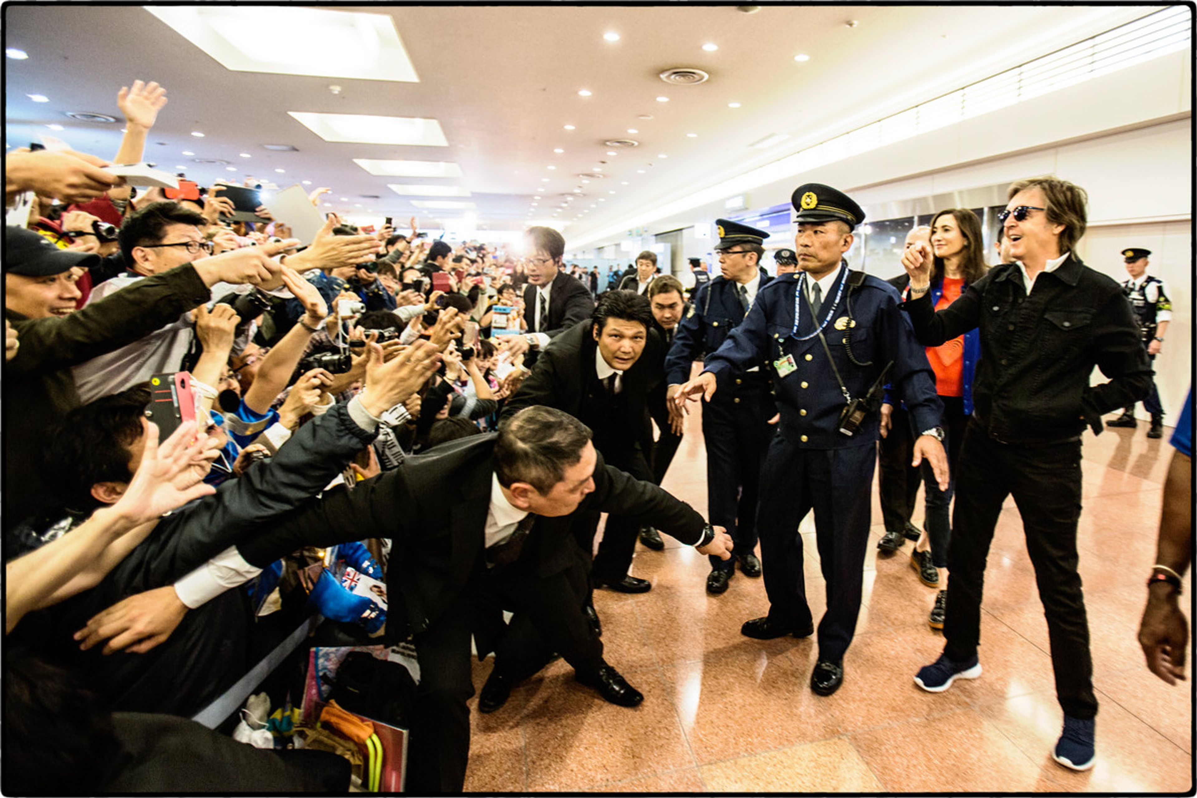 Paul greets fans at Tokyo International Airport, 23rd April 2017