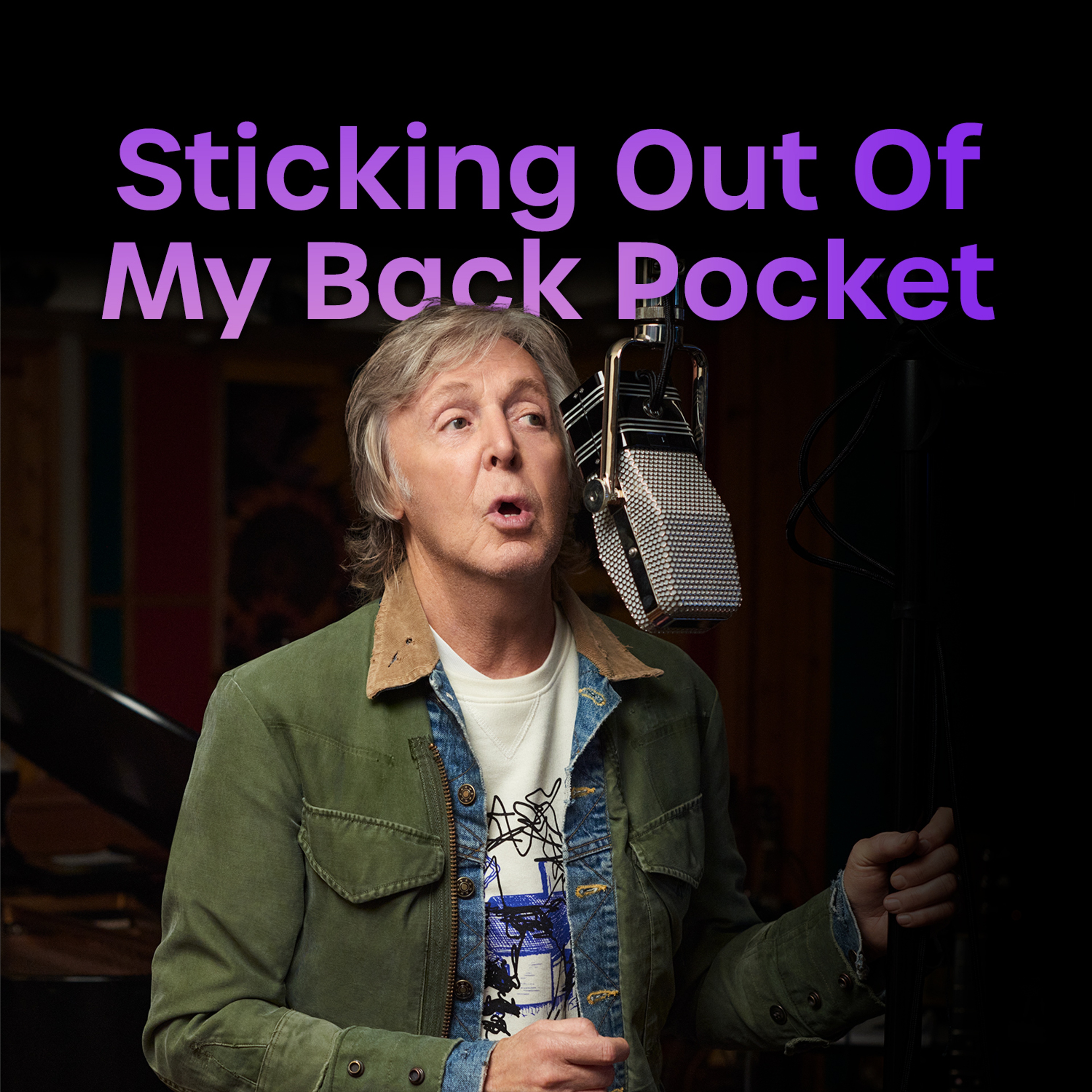 Playlist cover featuring a photo of Paul recording McCartney III at the microphone stand. Text overlayed for 'Sticking Out of My Back Pocket' May 2023