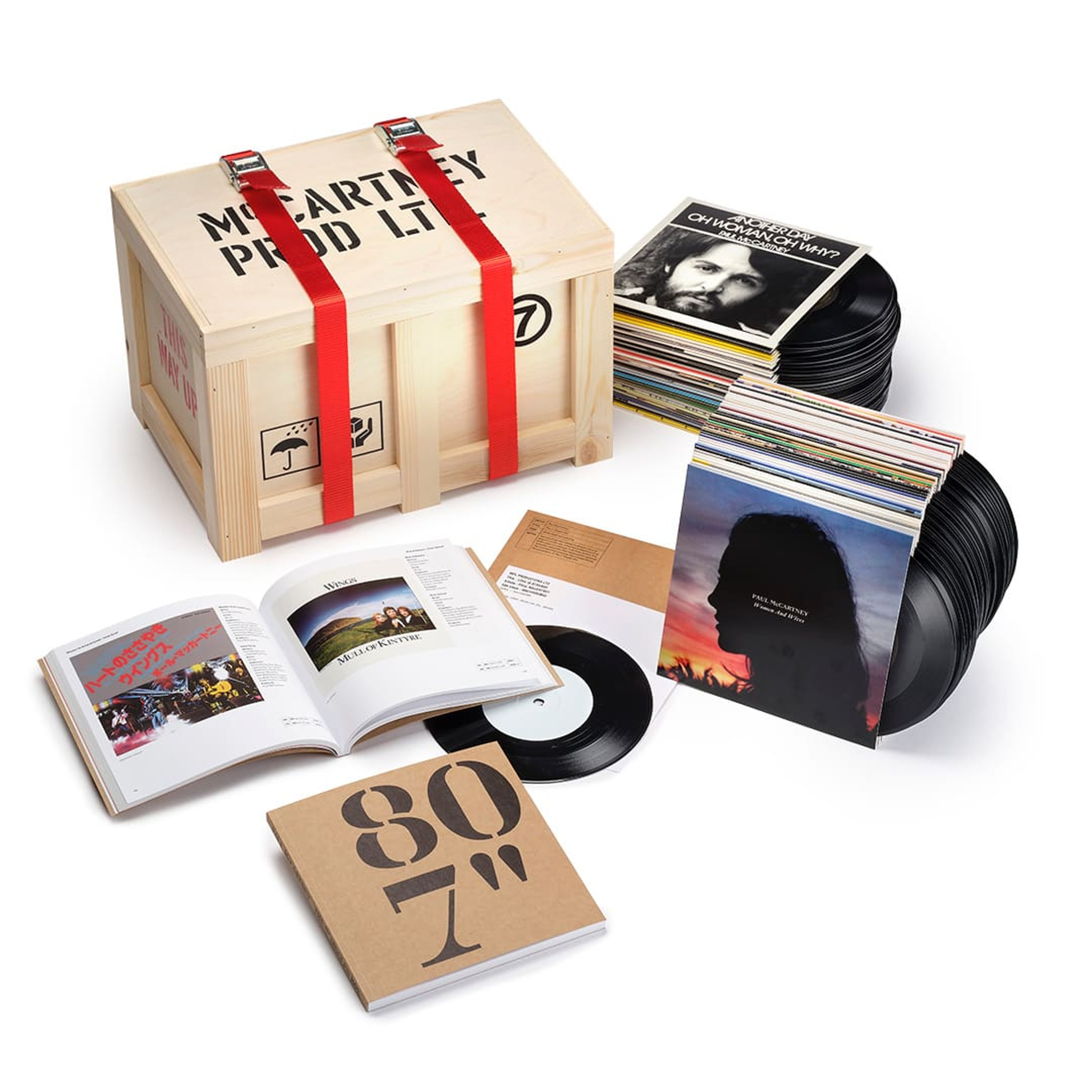 Photo of 'The 7" Singles Box' release which includes 80 7" vinyl, 148-page book including containing foreword from Paul, essay by Rob Sheffield, recording notes, release dates, and chart information.