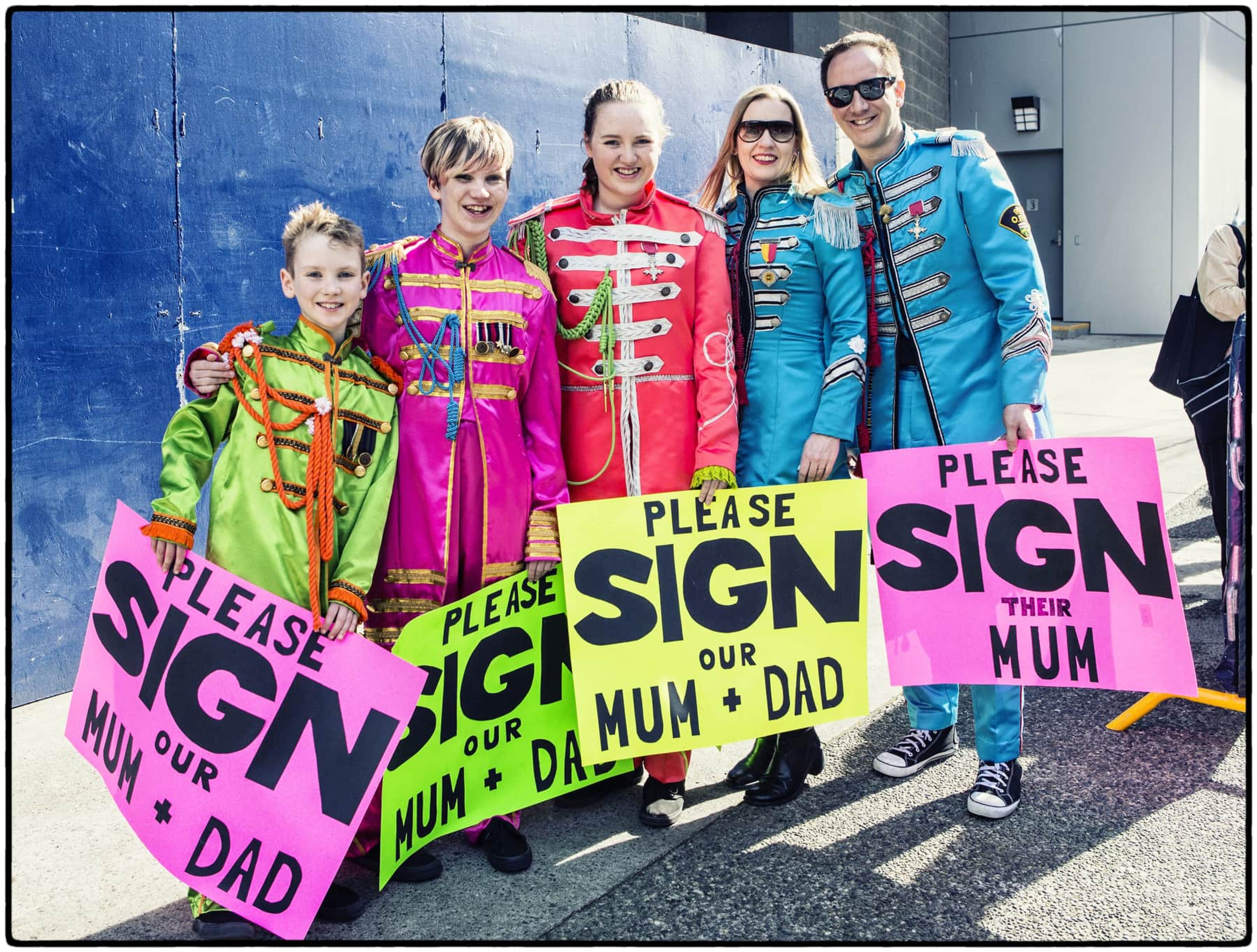 A family dressed in Sgt Pepper costumes
