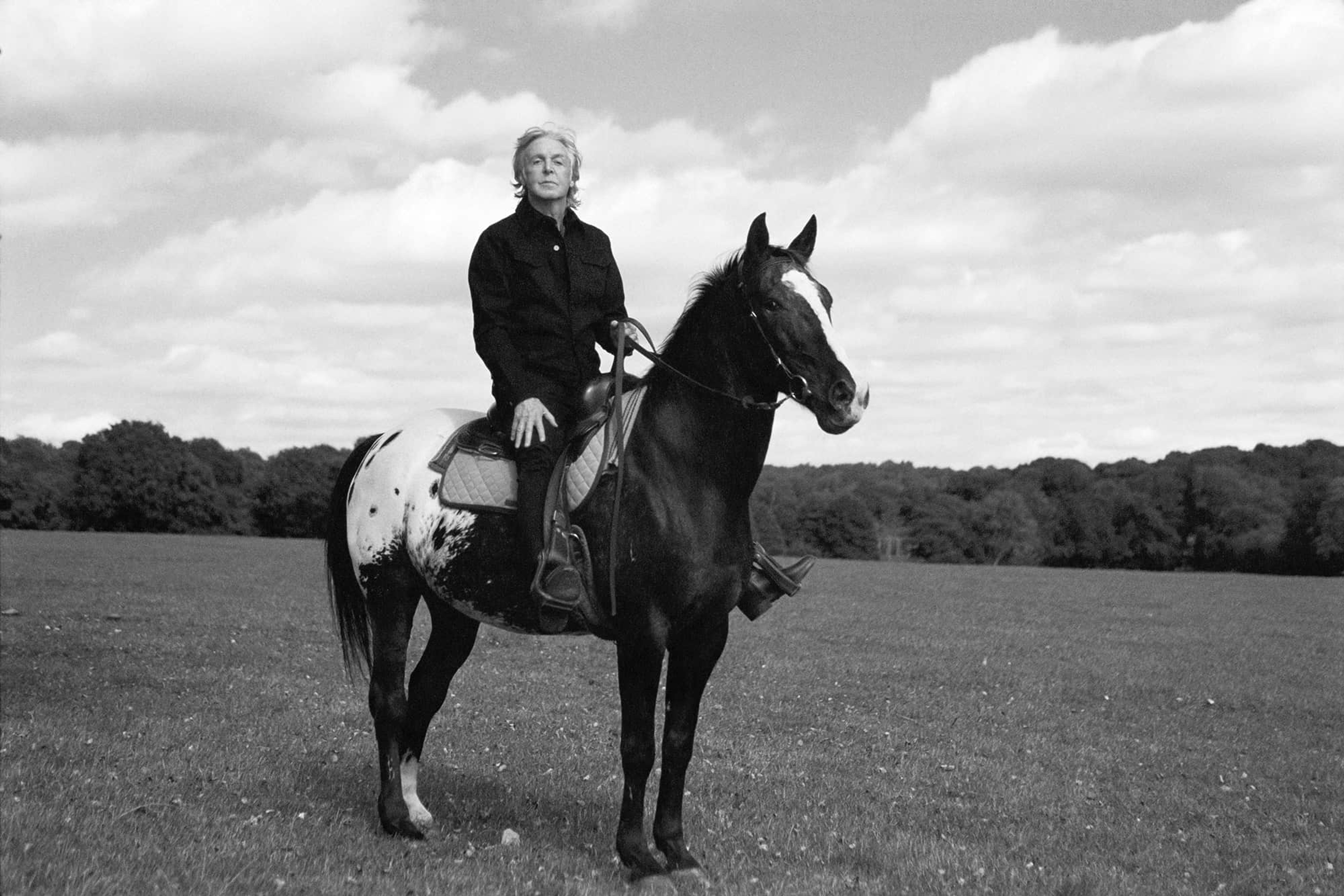 Black and white photo of Paul on horseback 