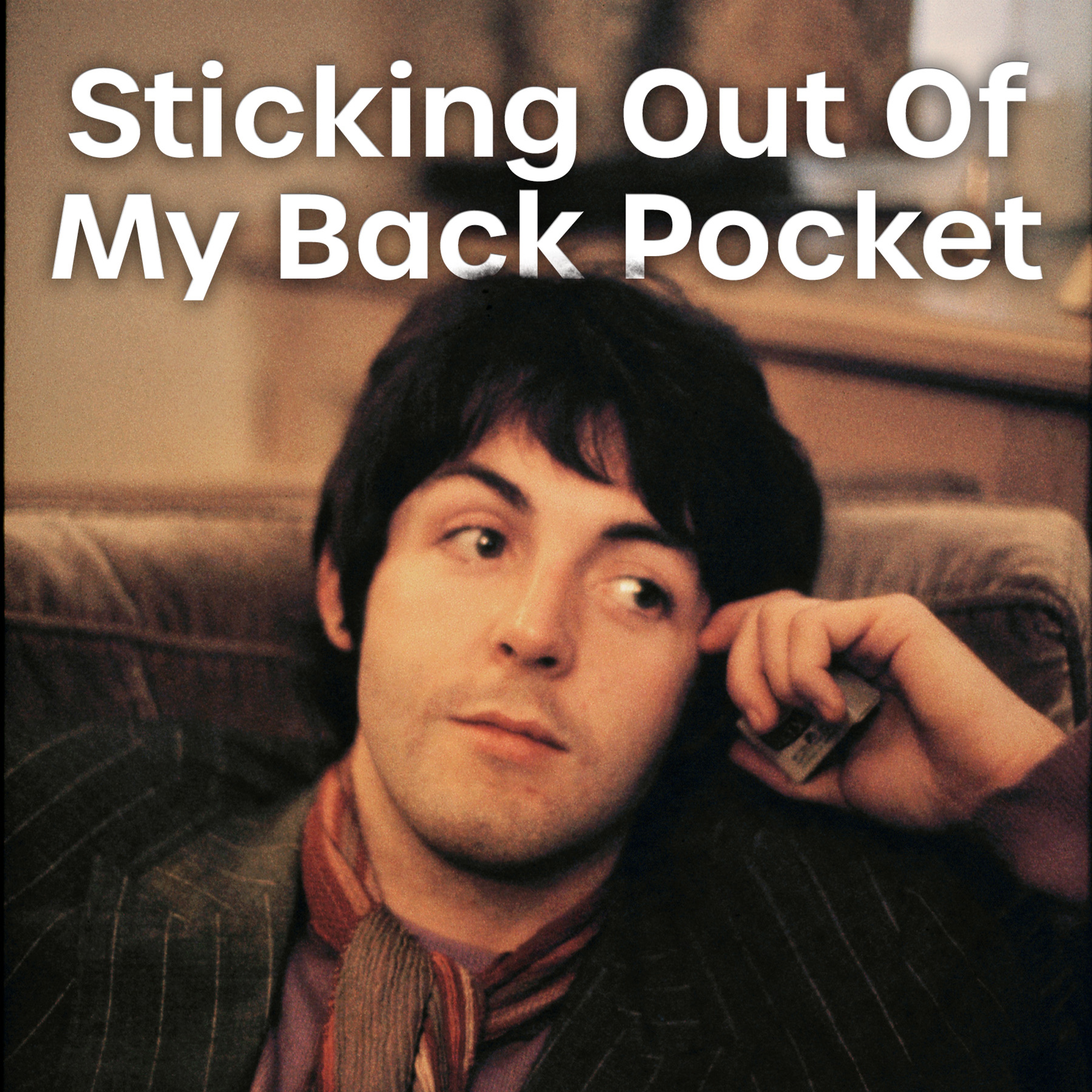 Photo of Paul McCartney taken by Linda McCartney with the logo for the monthly Spotify playlist 'Sticking Out Of My Back Pocket'