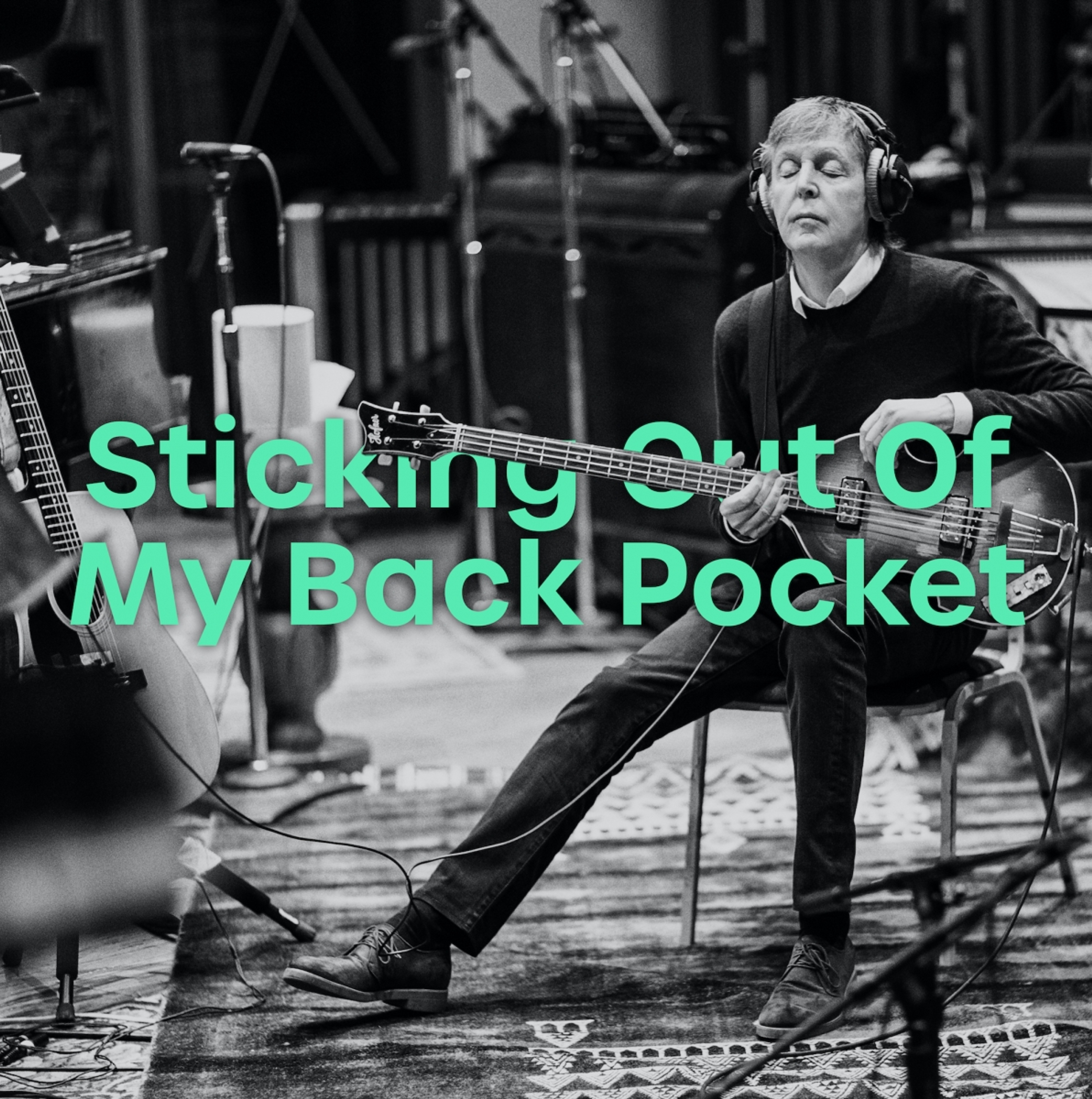 photo of Paul playing bass for the 'Sticking Out Of My Back Pocket' playlist for July 2020