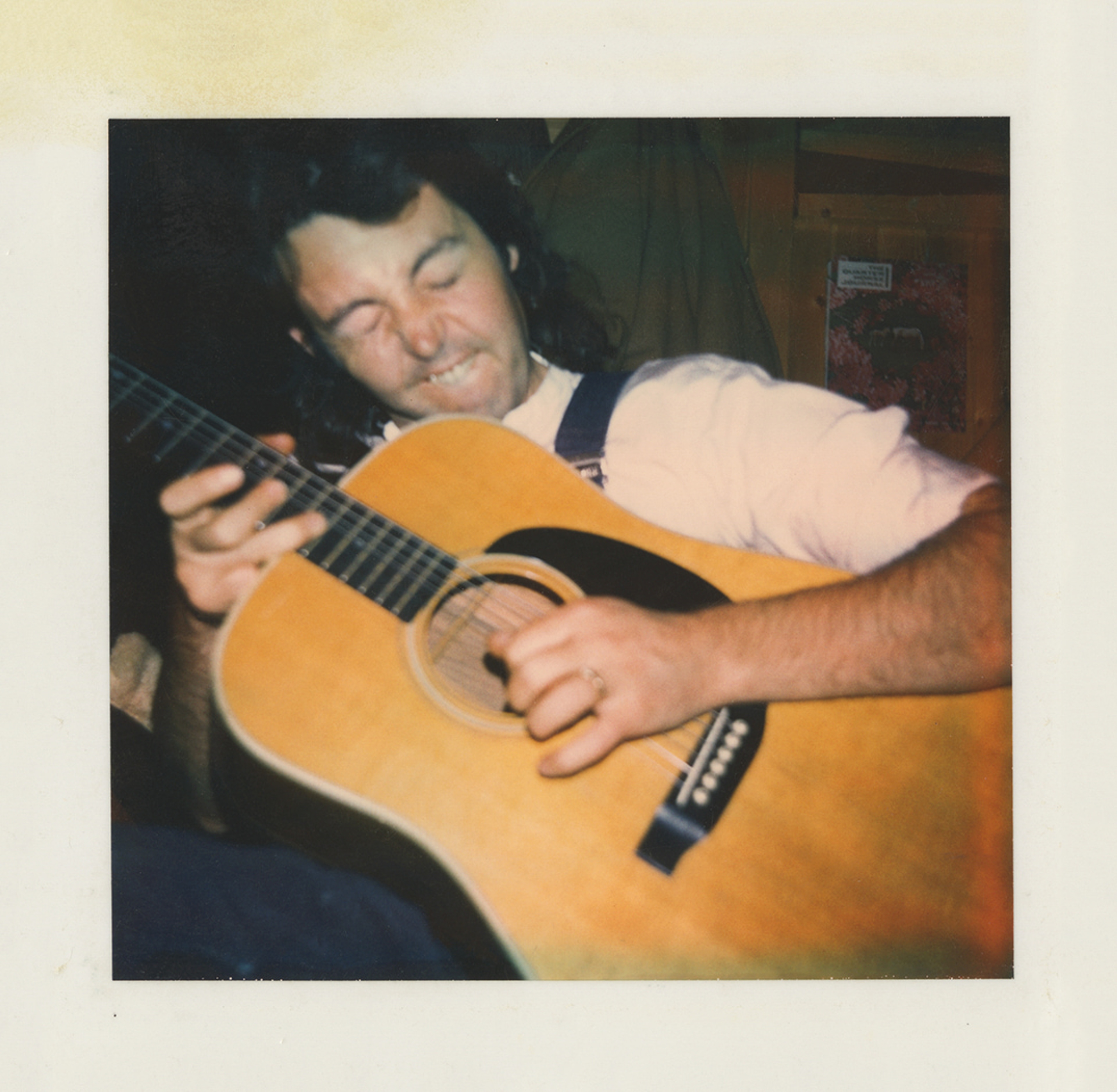 Polaroid Photo Of Paul McCartney playing guitar