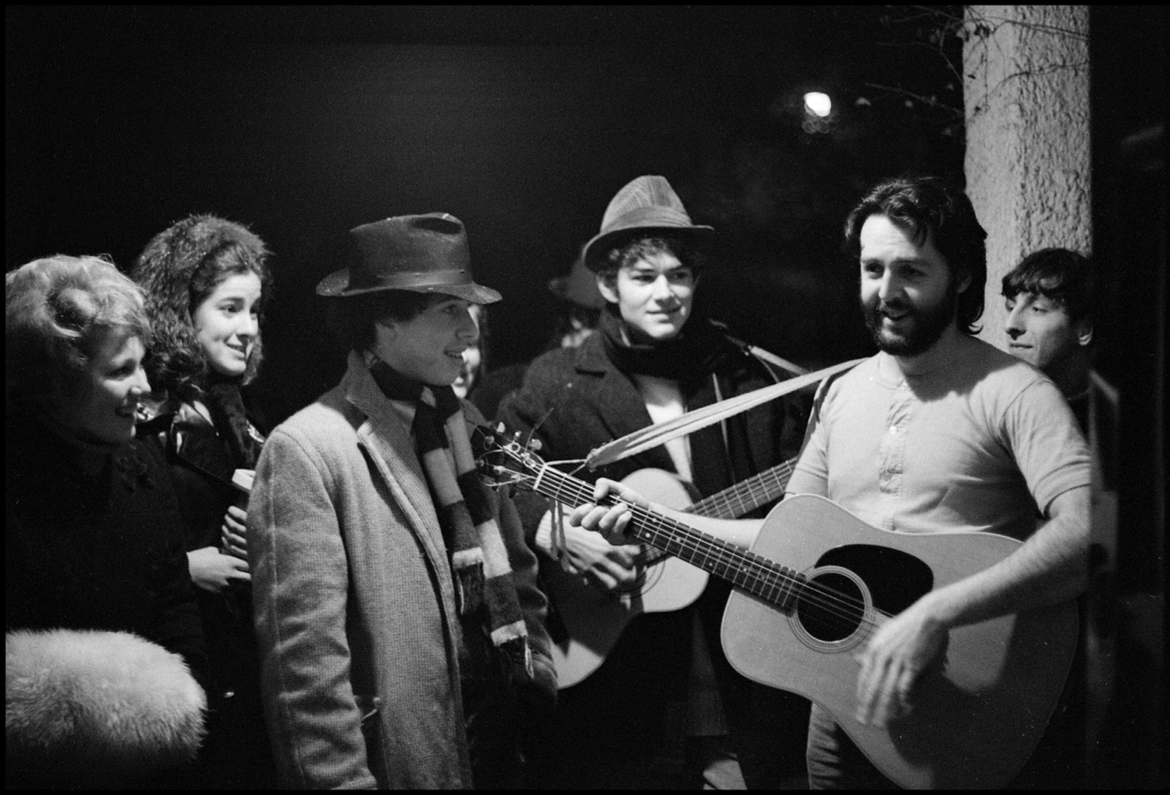 Paul with carol singers. Heswall, 1968 photo by Linda McCartney