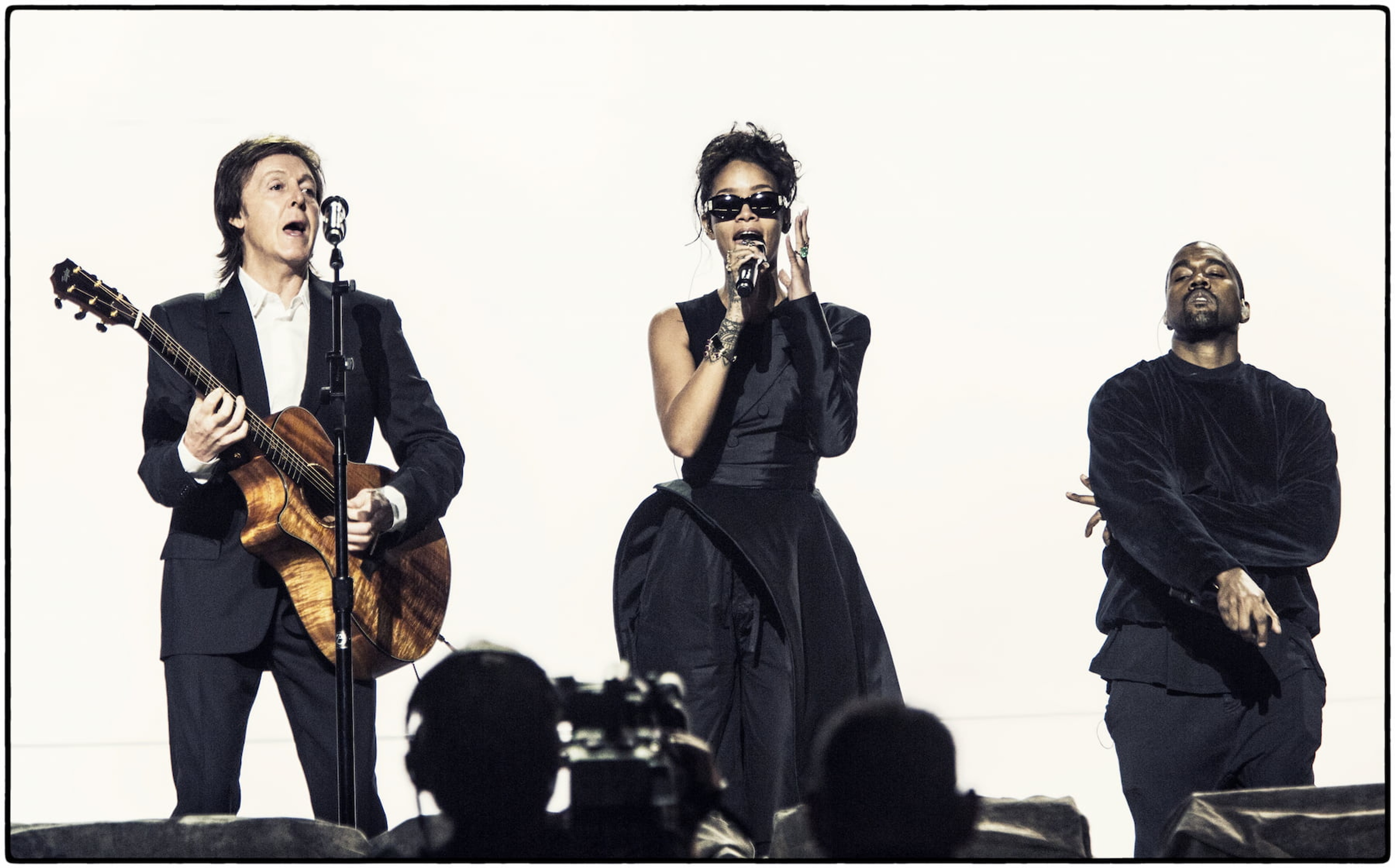 Photo of Paul McCartney on Guitar with Rihanna and Kanye West performing 'FourFiveSeconds' at the GRAMMY Awards.